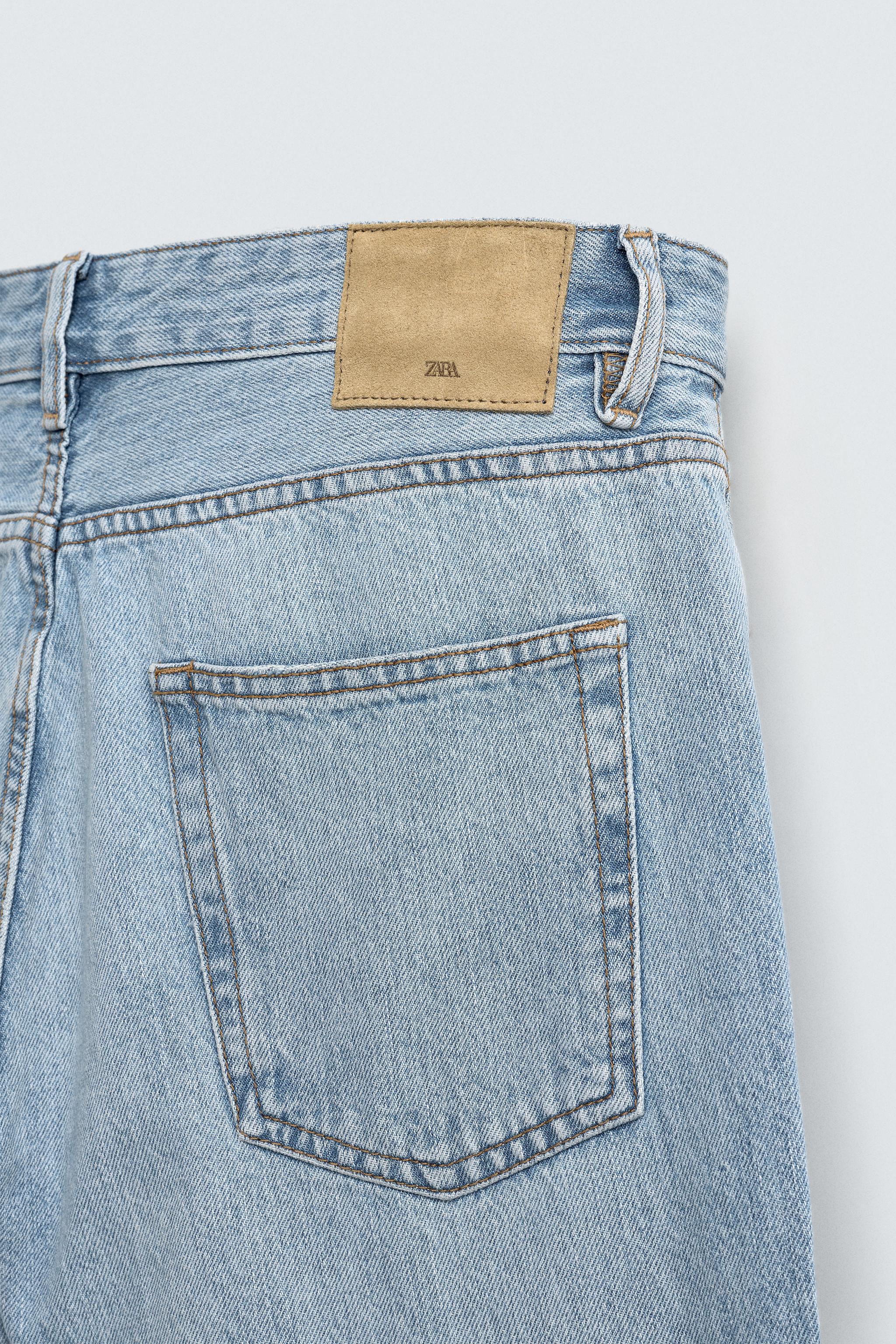 SLIM TAPERED FIT JEANS