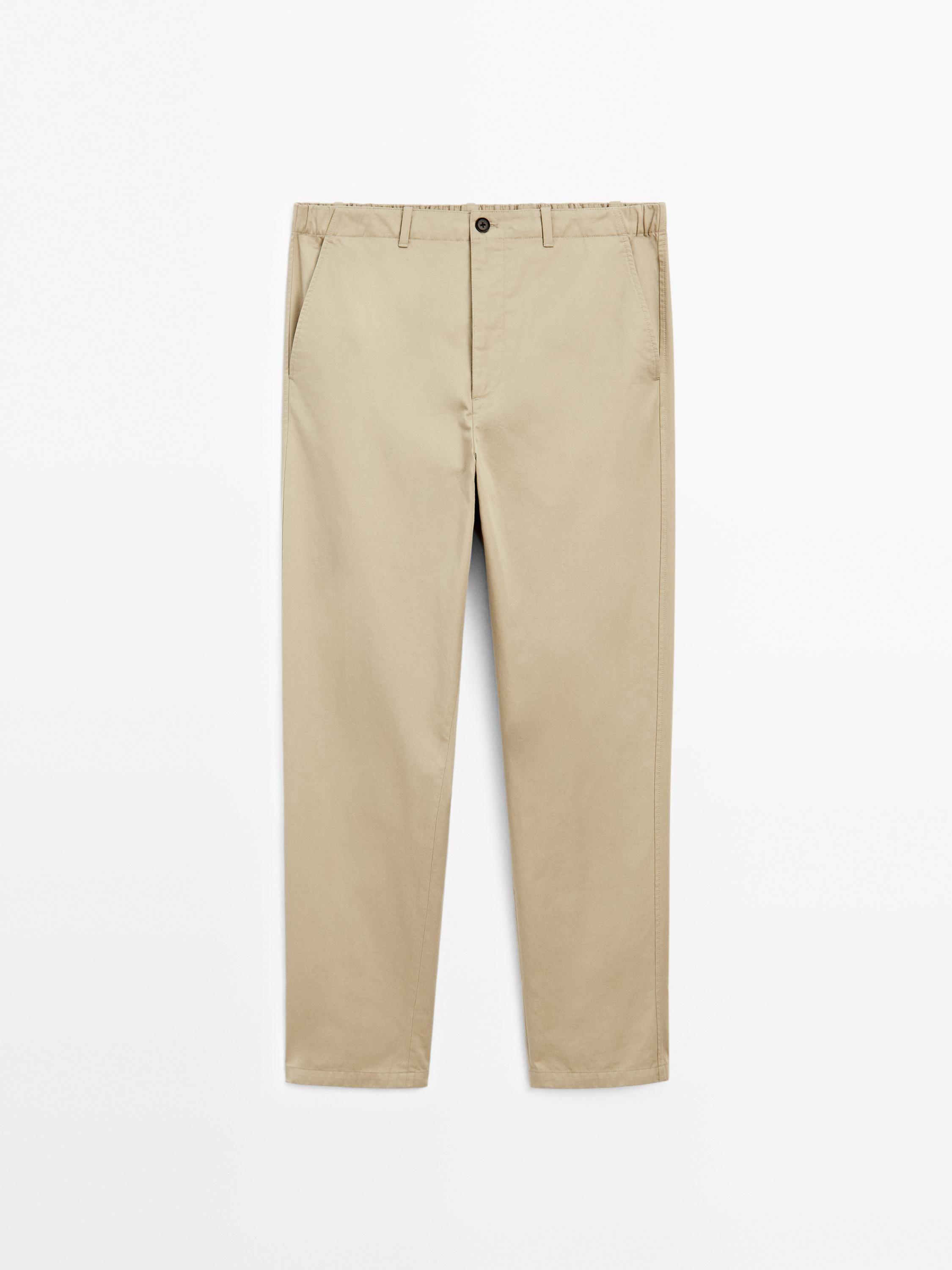 Trousers with patch pocket