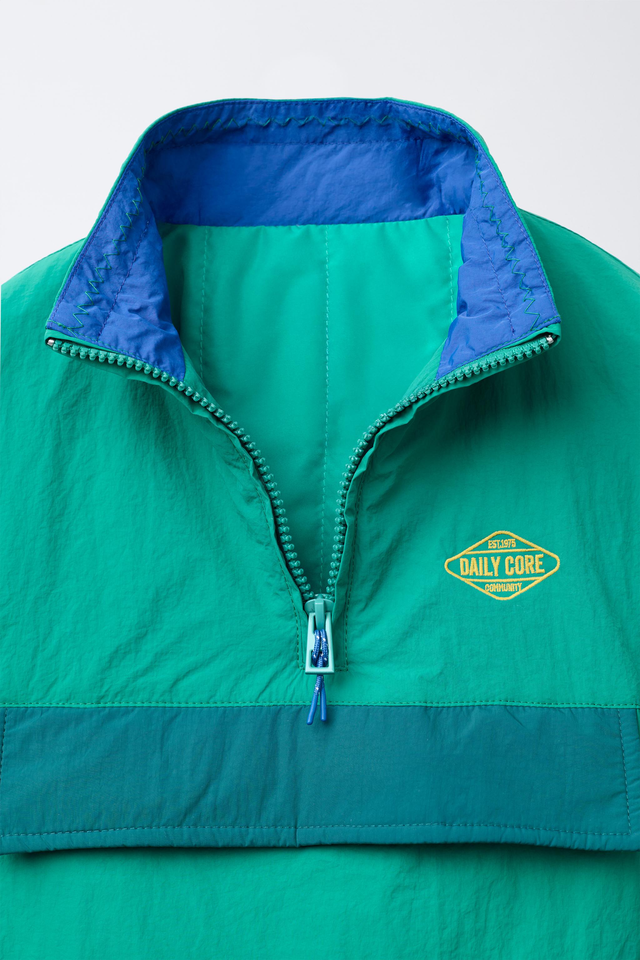 TECHNICAL POUCH POCKET SWEATSHIRT