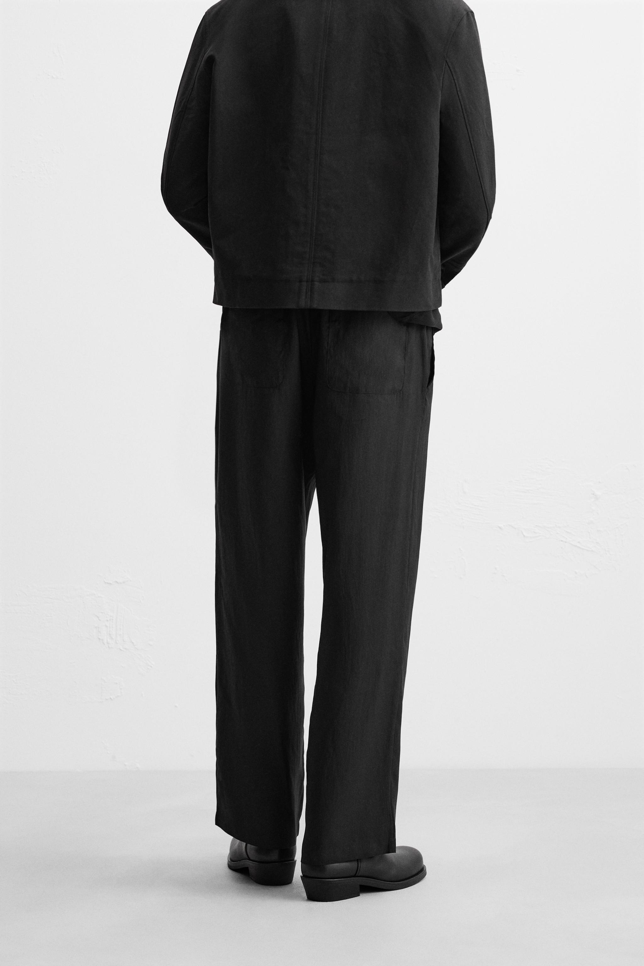 RELAXED FIT FLOWY PANTS