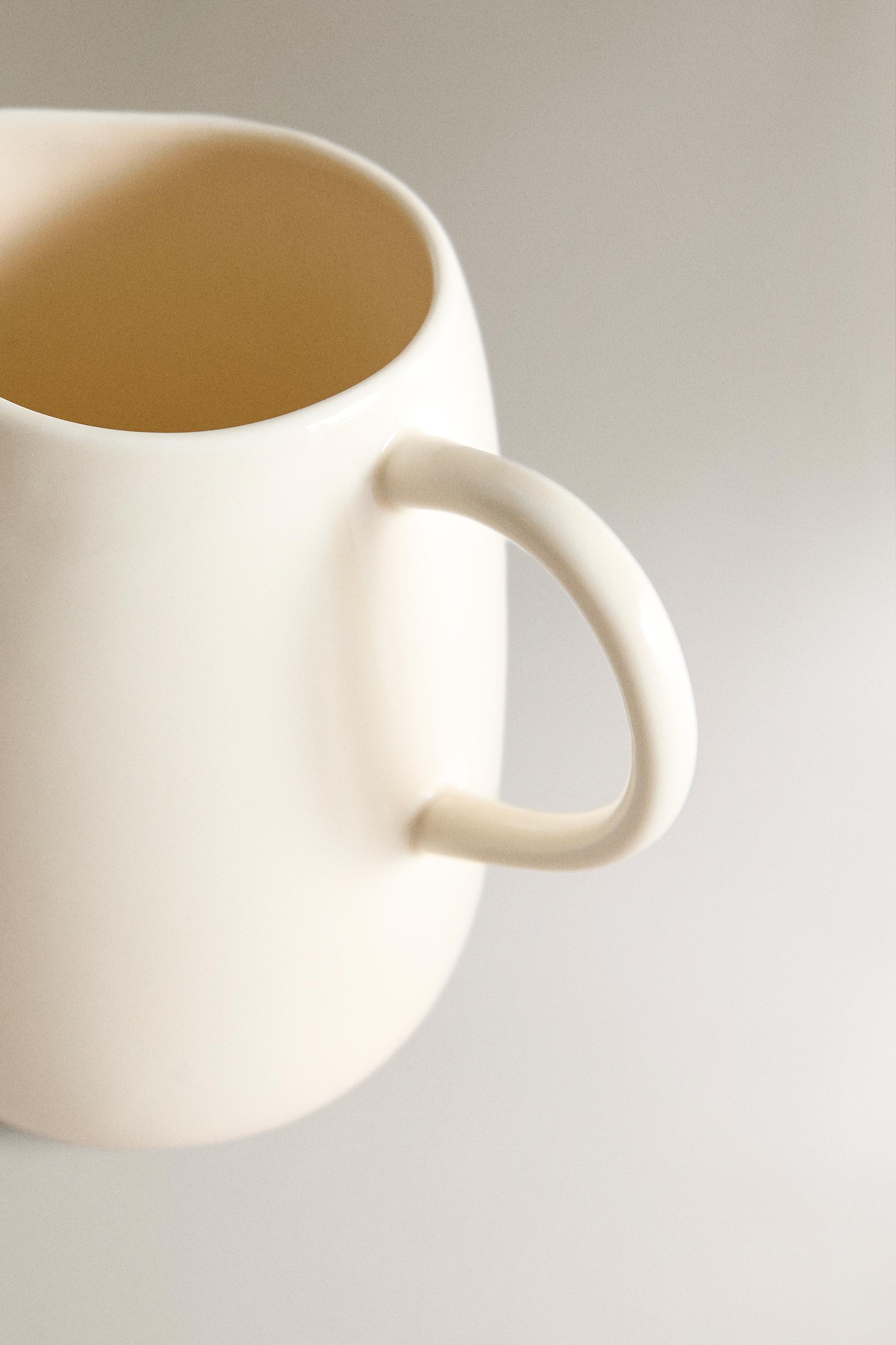 PLAIN STONEWARE MILK PITCHER