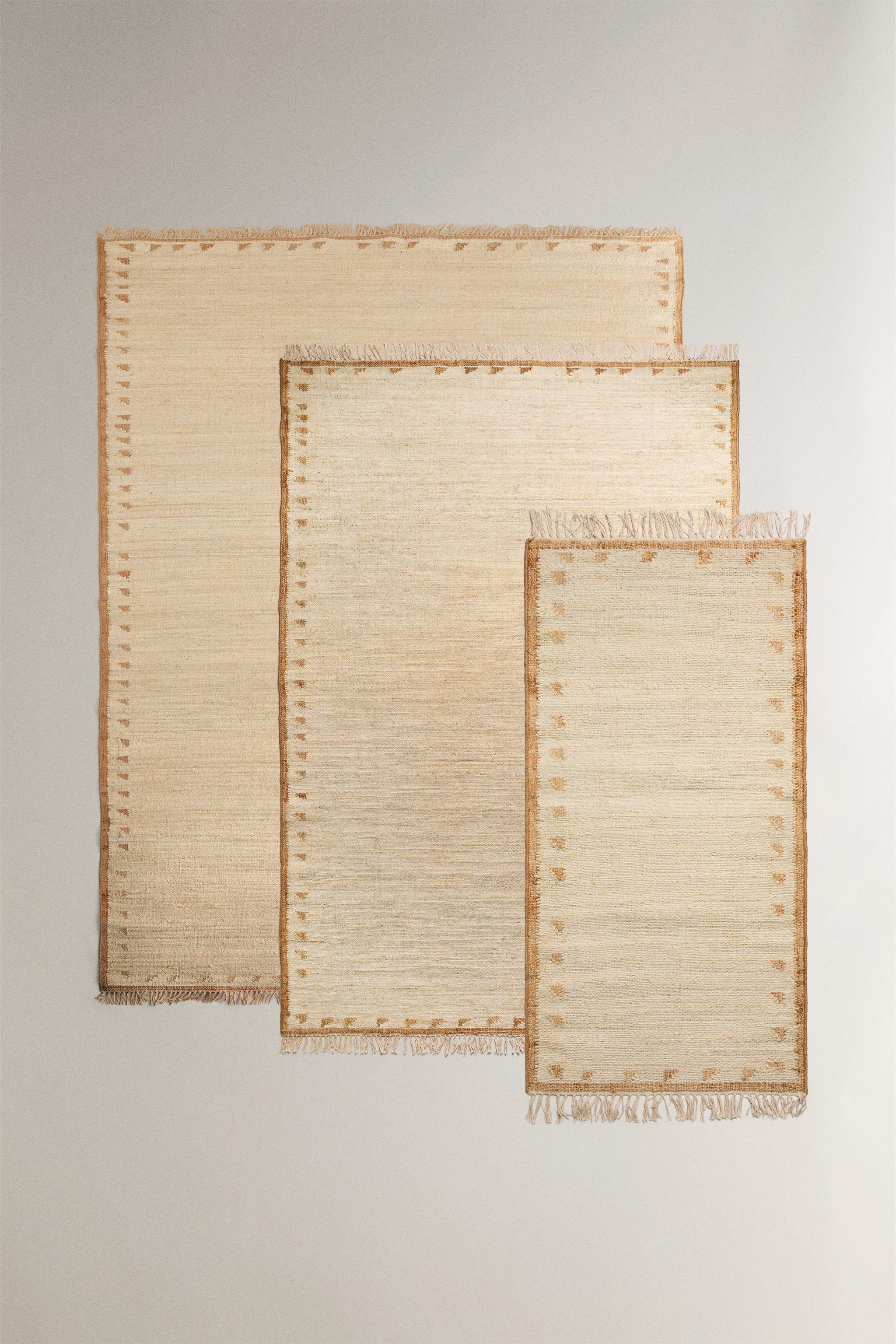 JUTE AND COTTON AREA RUG WITH FRINGING
