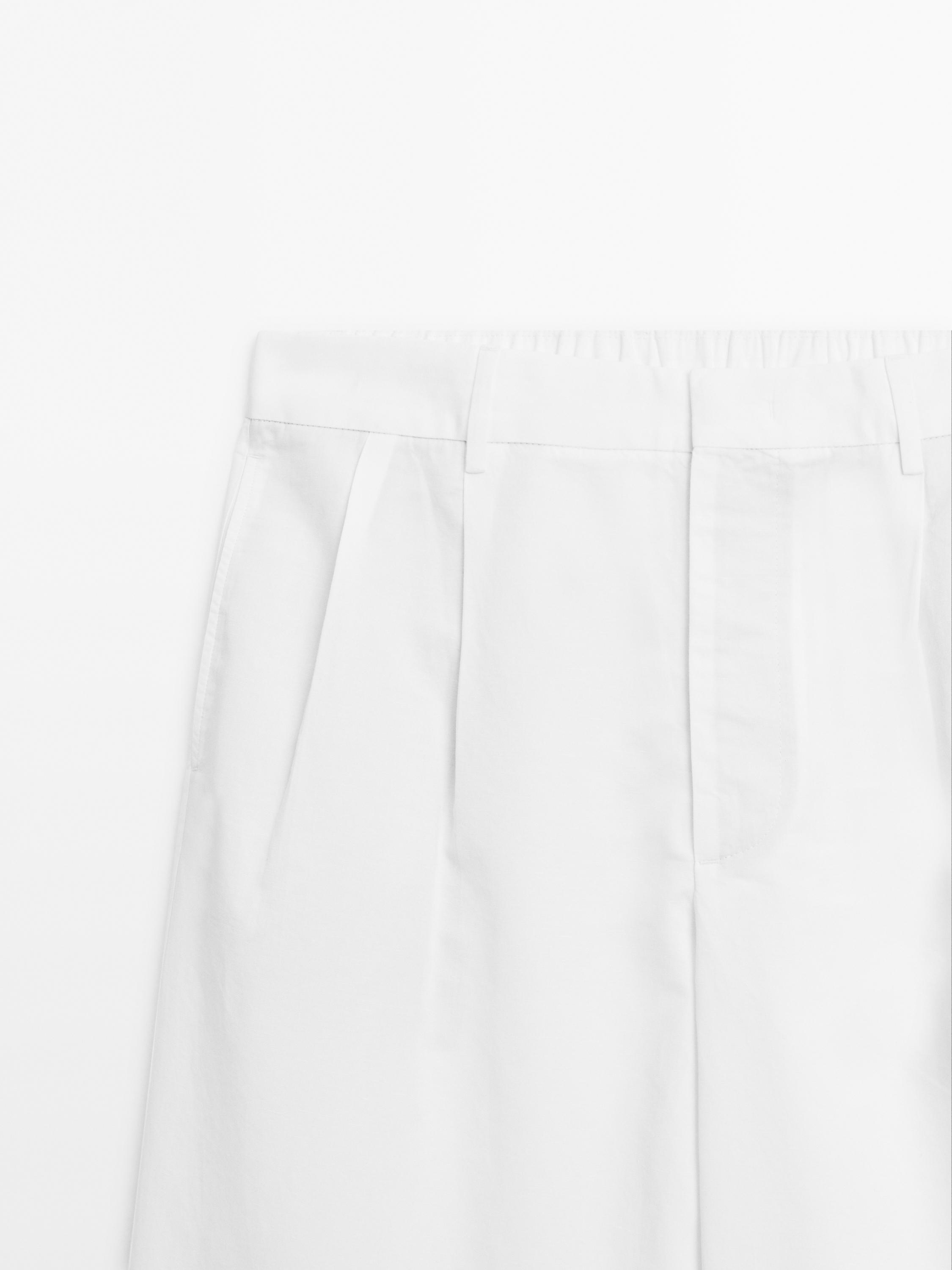 Balloon fit trousers with double darts