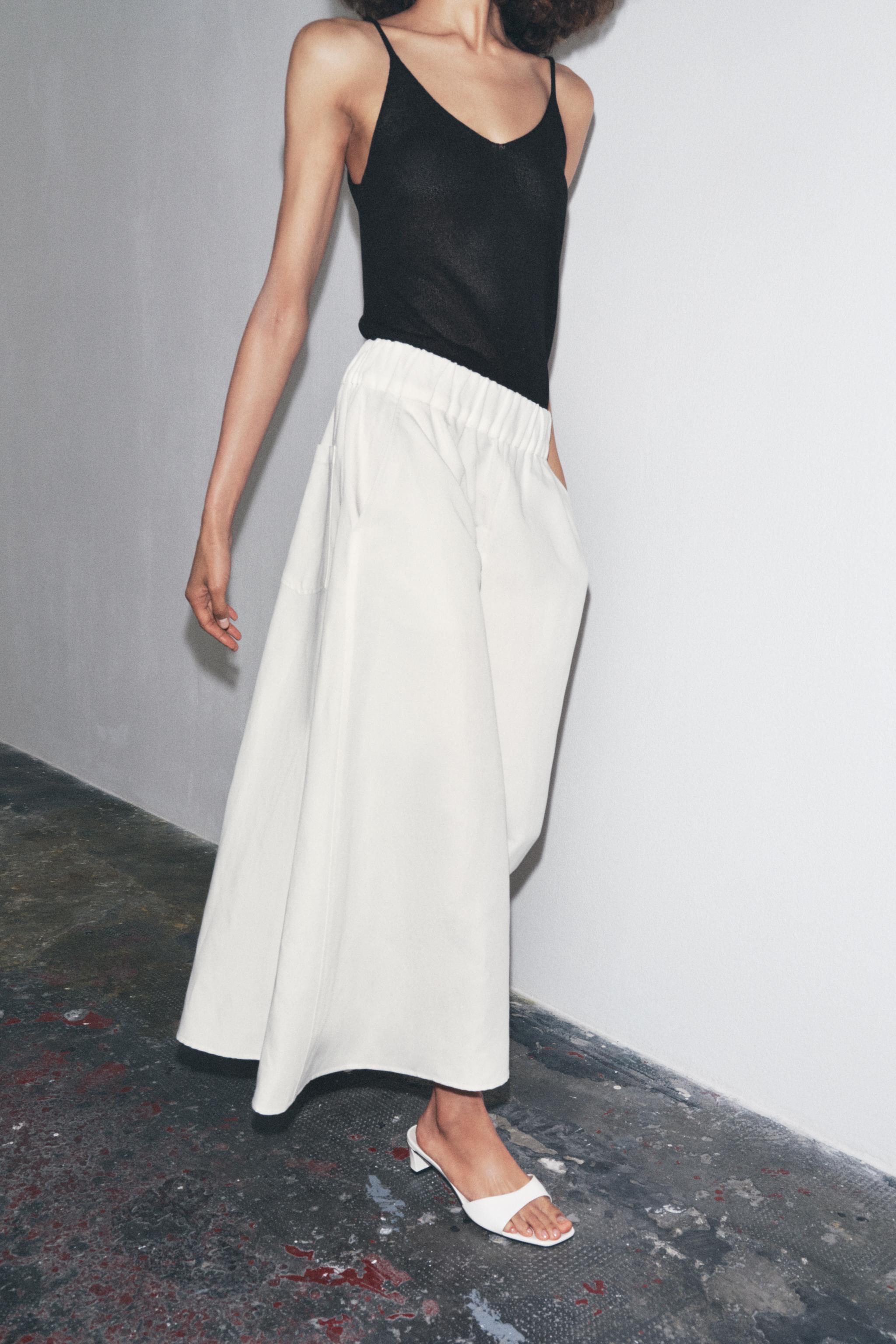 LOW HEELED LEATHER SANDALS