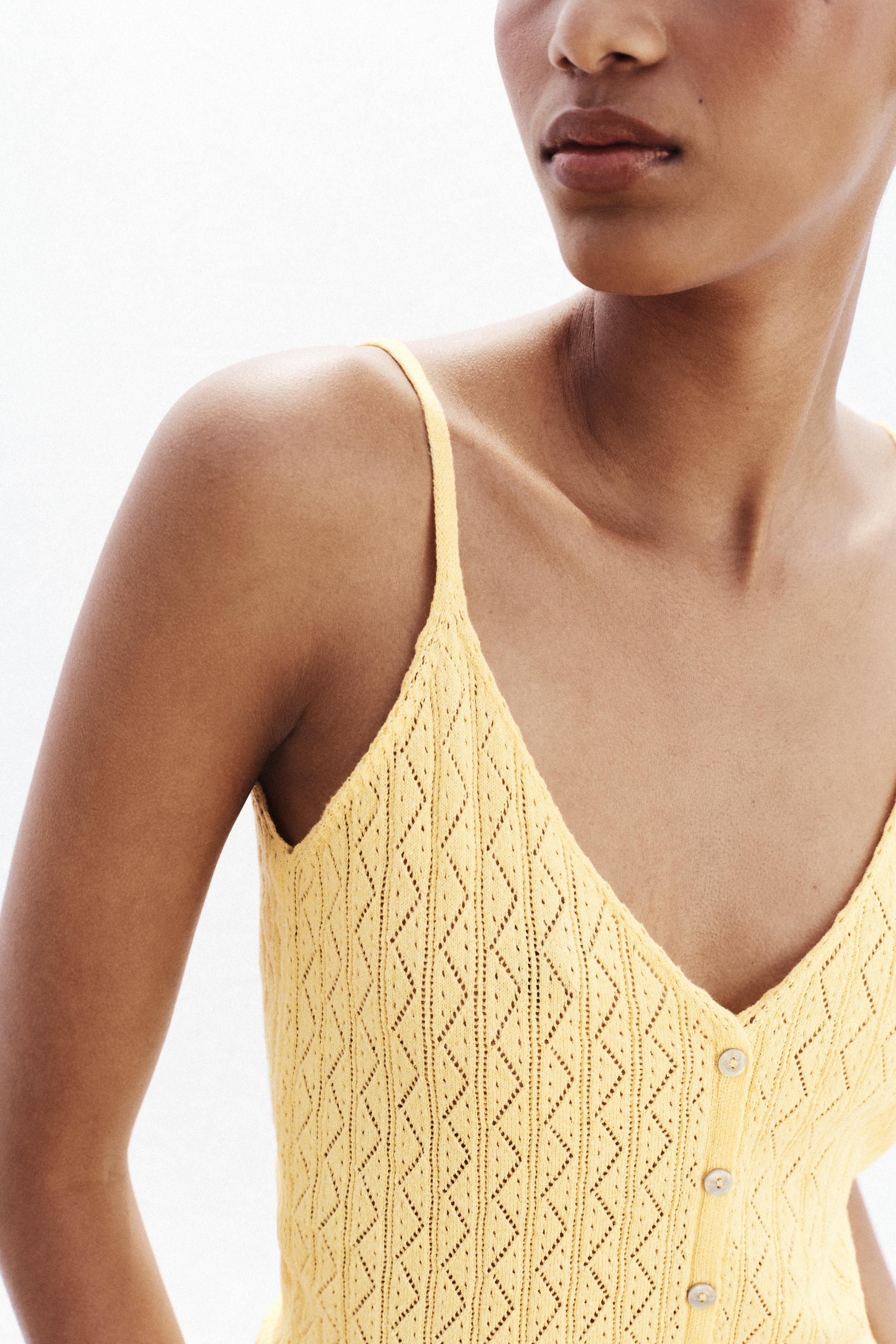 POINTELLE KNIT RUFFLED TOP