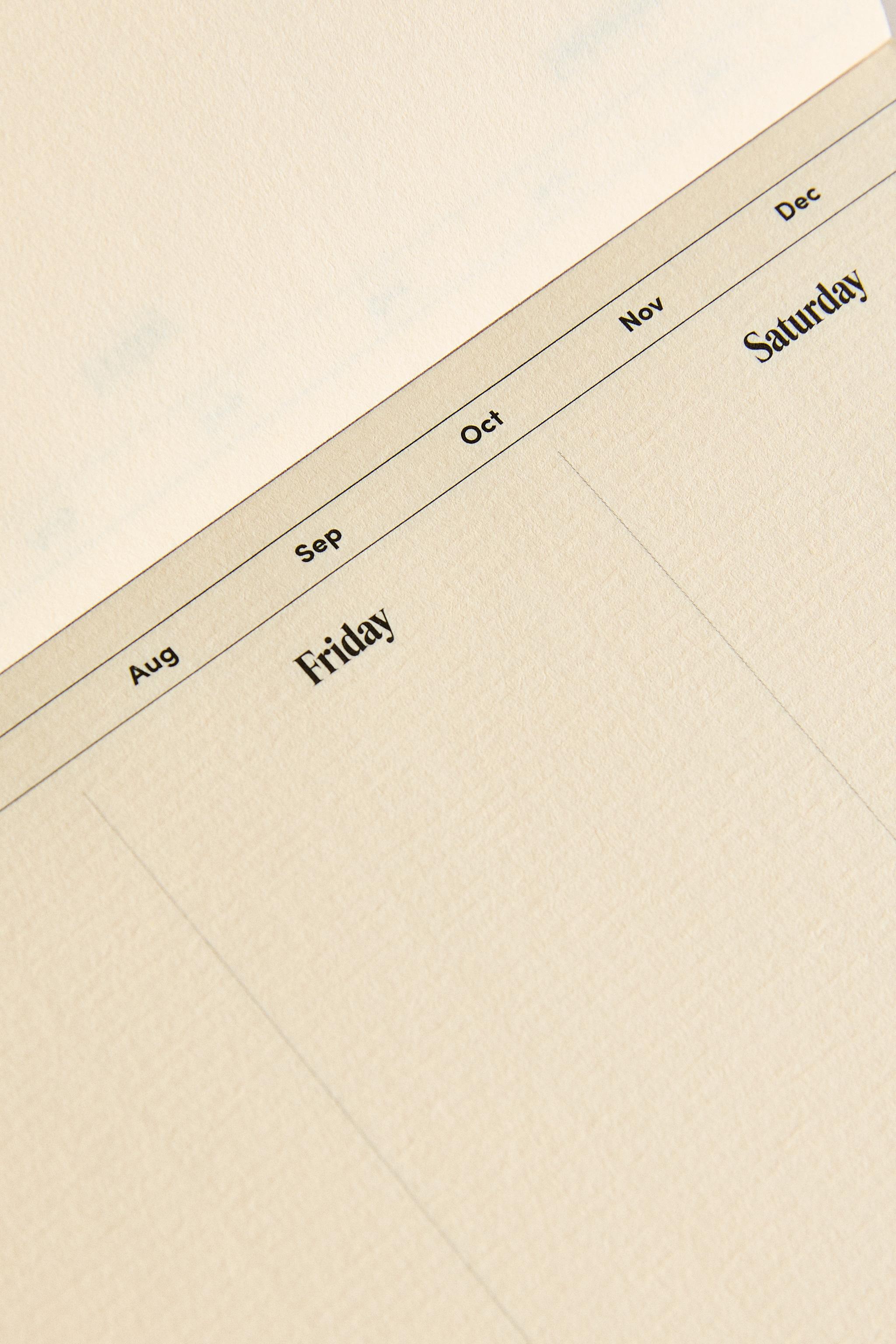 WEEKLY PLANNER WITH GOLD RIMS