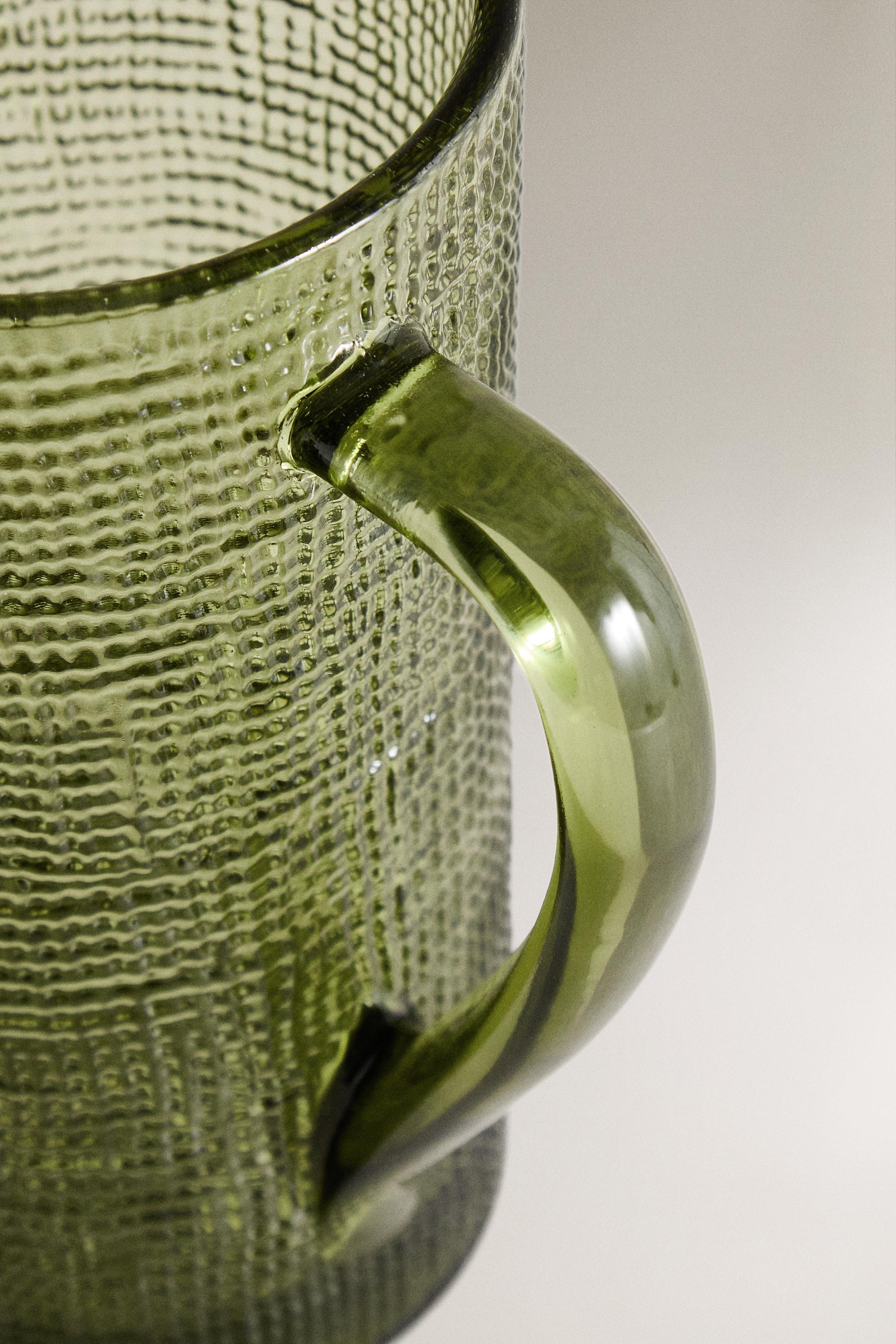 RAISED DESIGN GLASS PITCHER