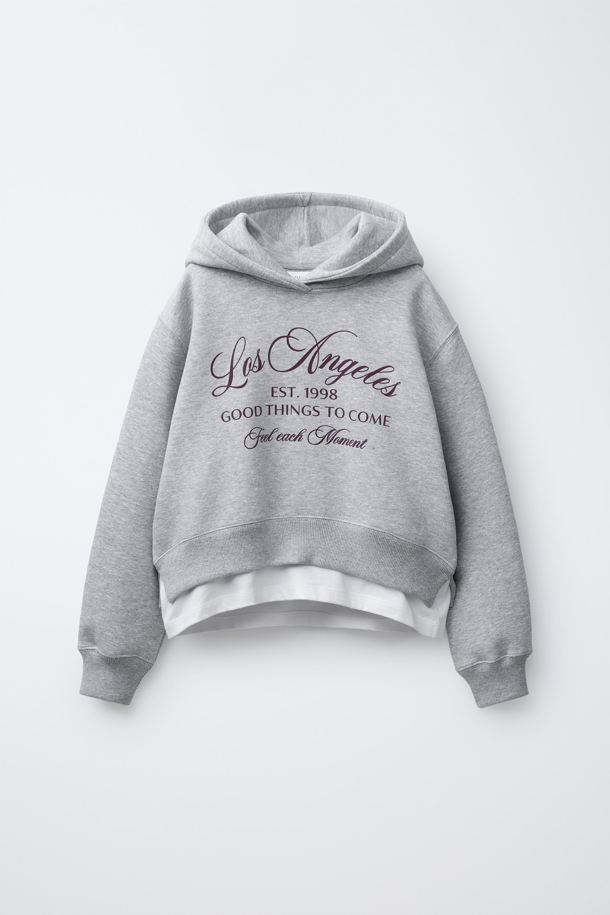 VARSITY DOUBLE HEM HOODED SWEATSHIRT