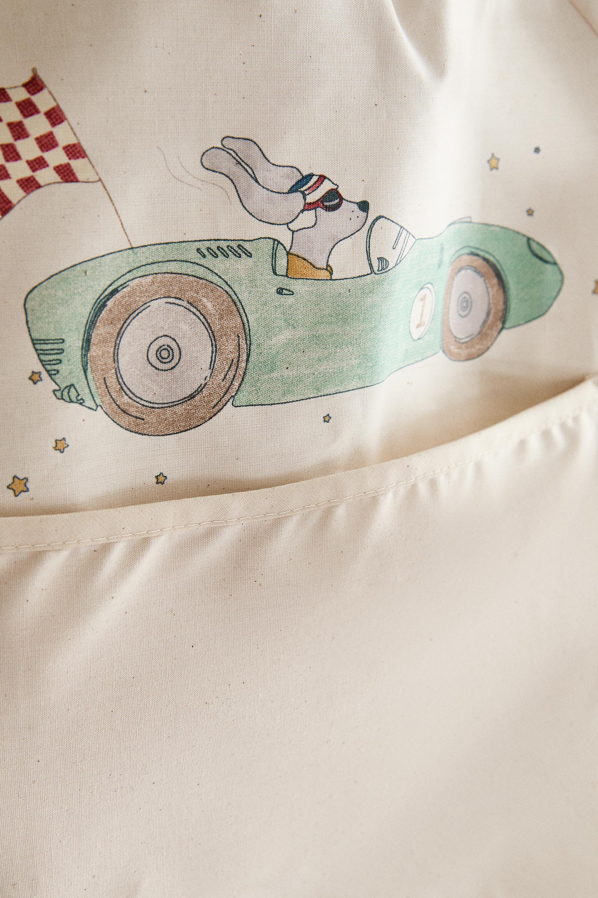 BABY BIB WITH SLEEVES AND RACING DOG