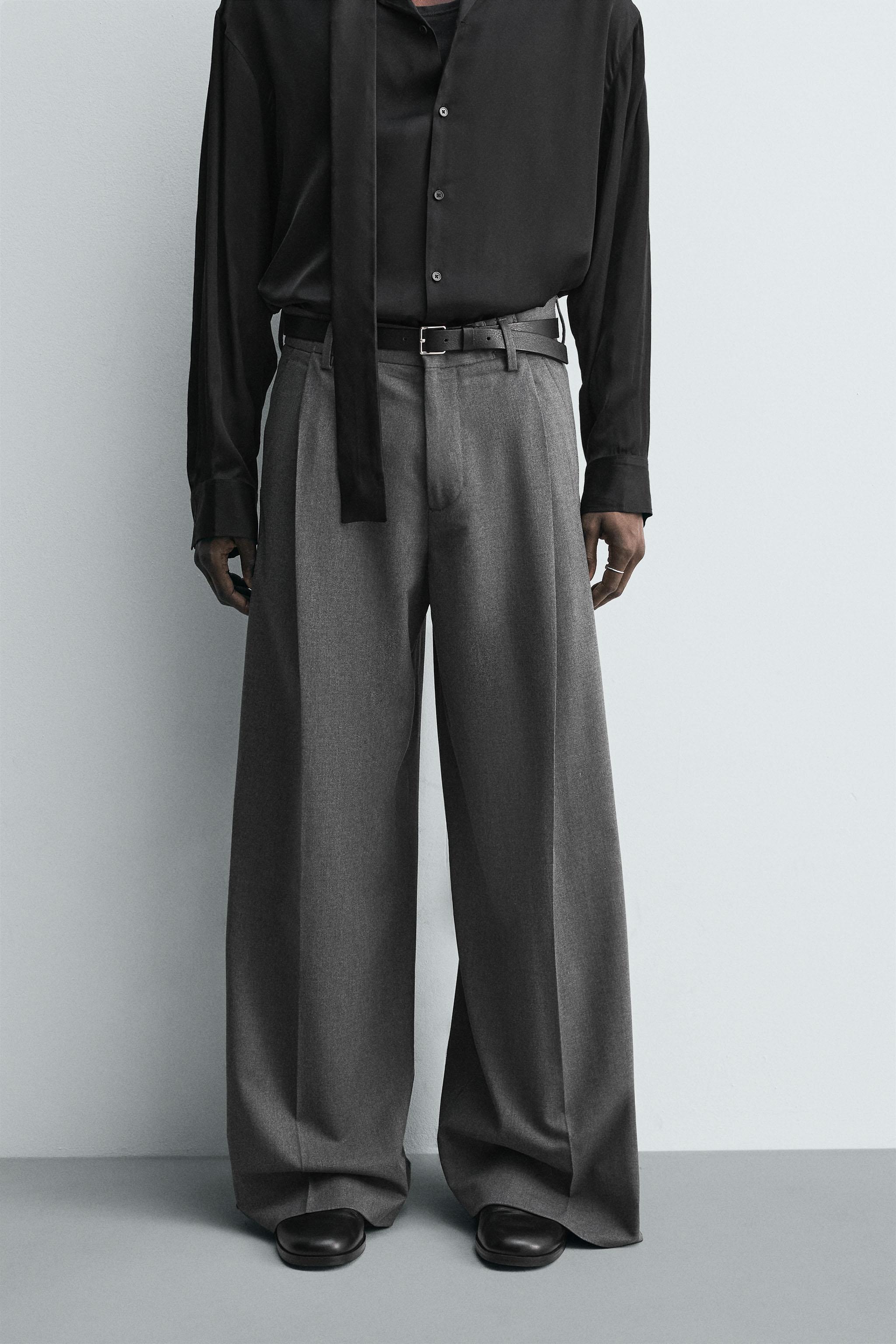 PLEATED WIDE FIT PANTS