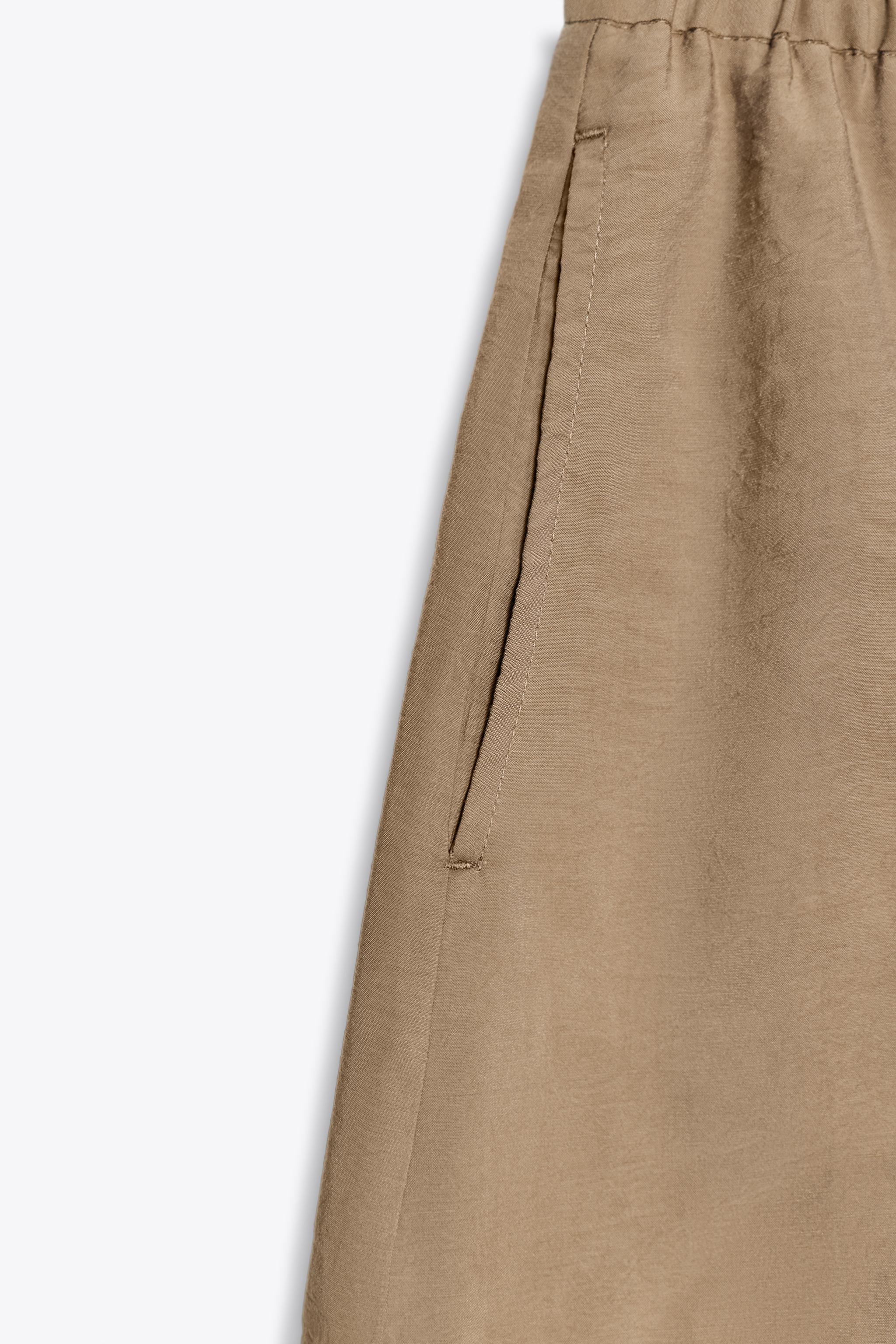 BEADED DRAWSTRING SHORTS