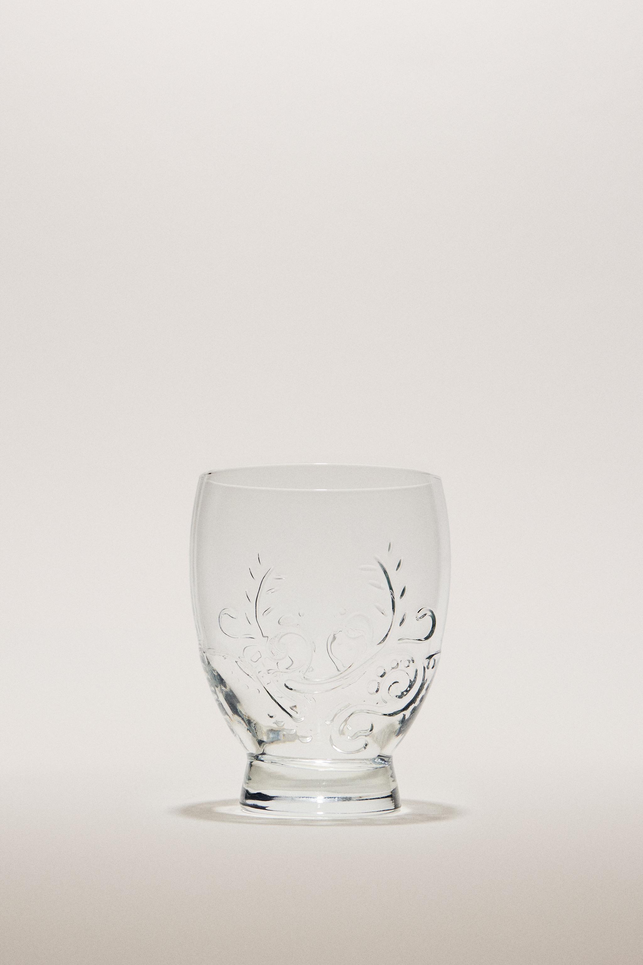 RAISED FLORAL DESIGN GLASS TUMBLER