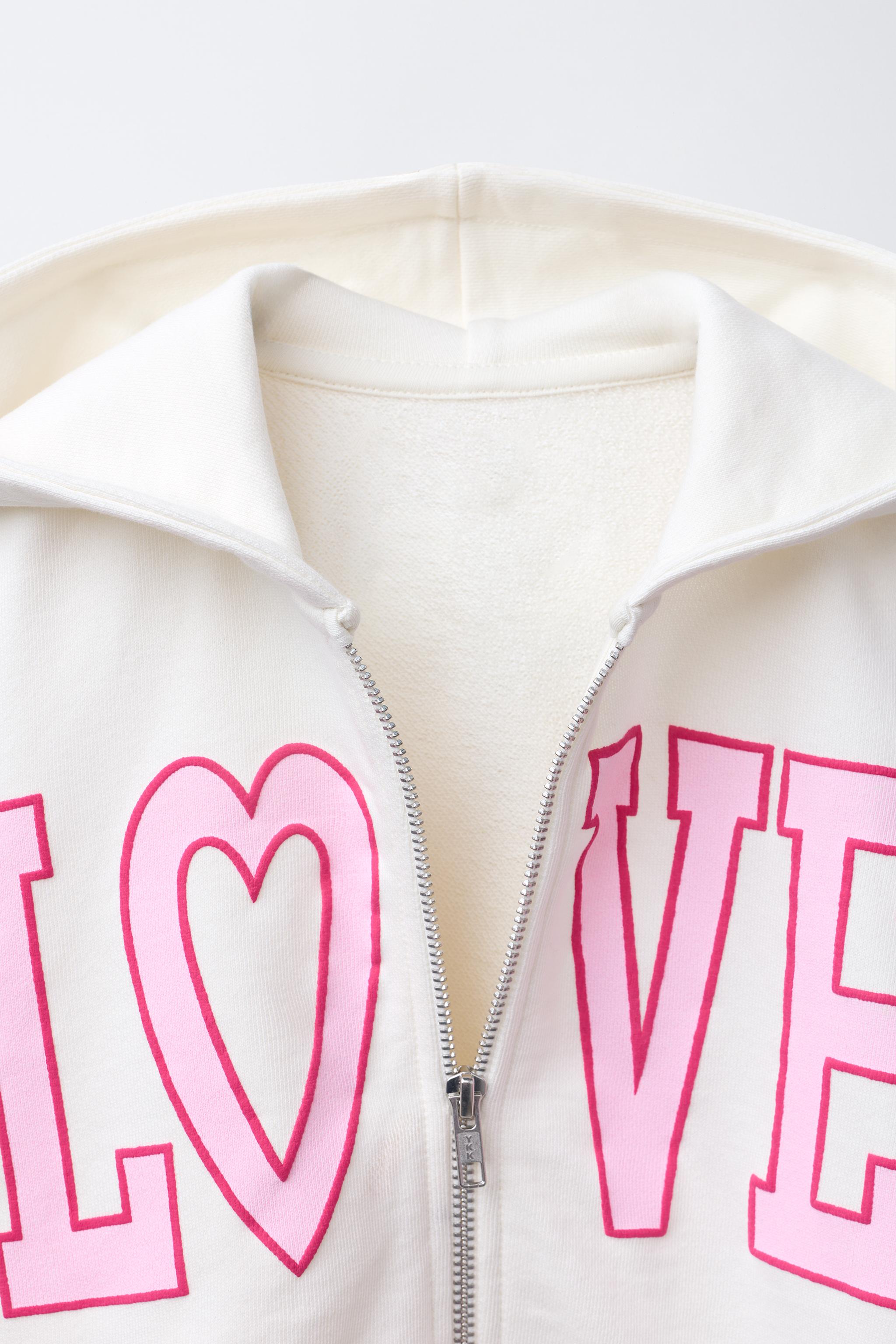 VARSITY ZIP SWEATSHIRT