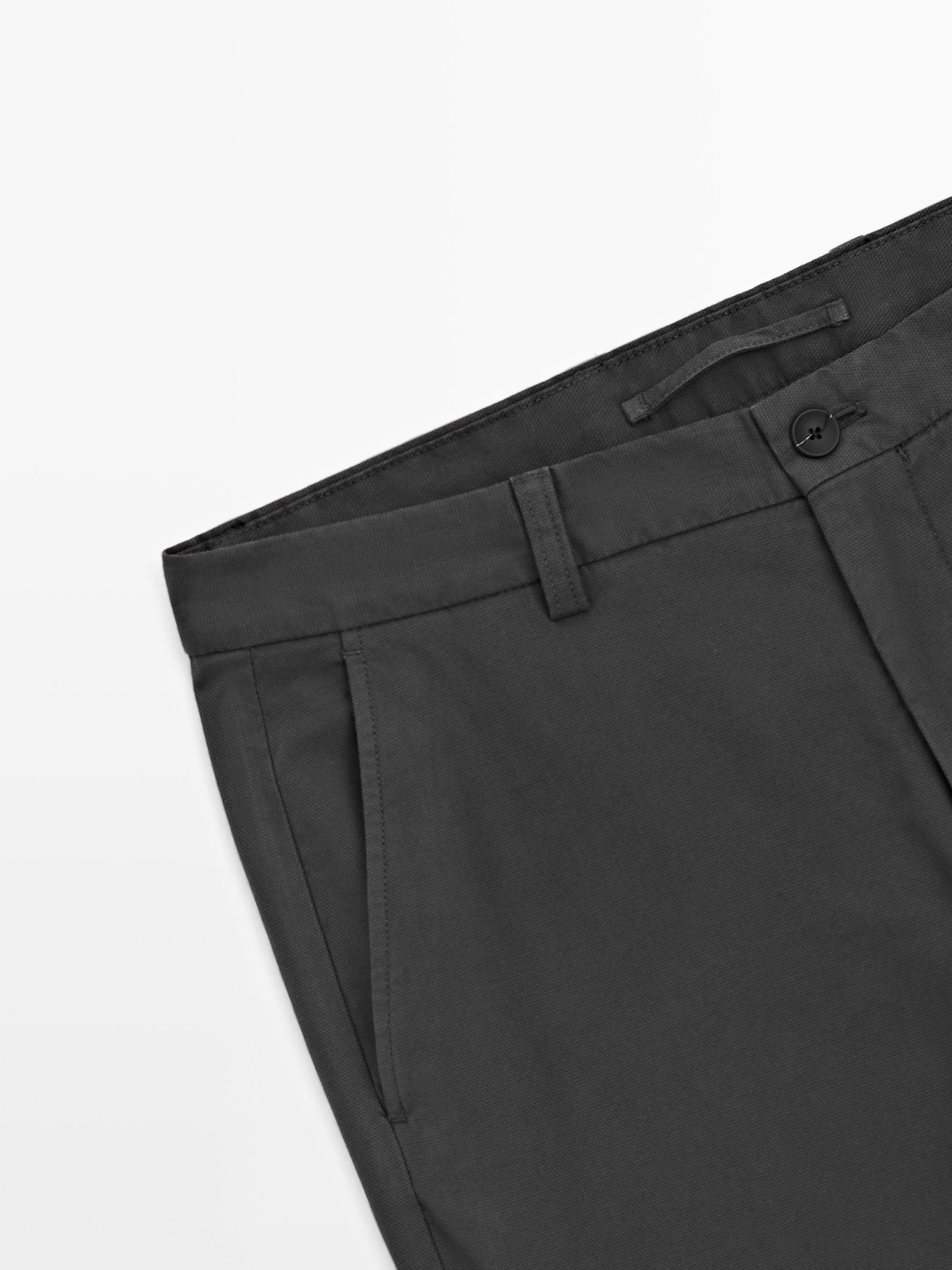 Slim fit textured trousers