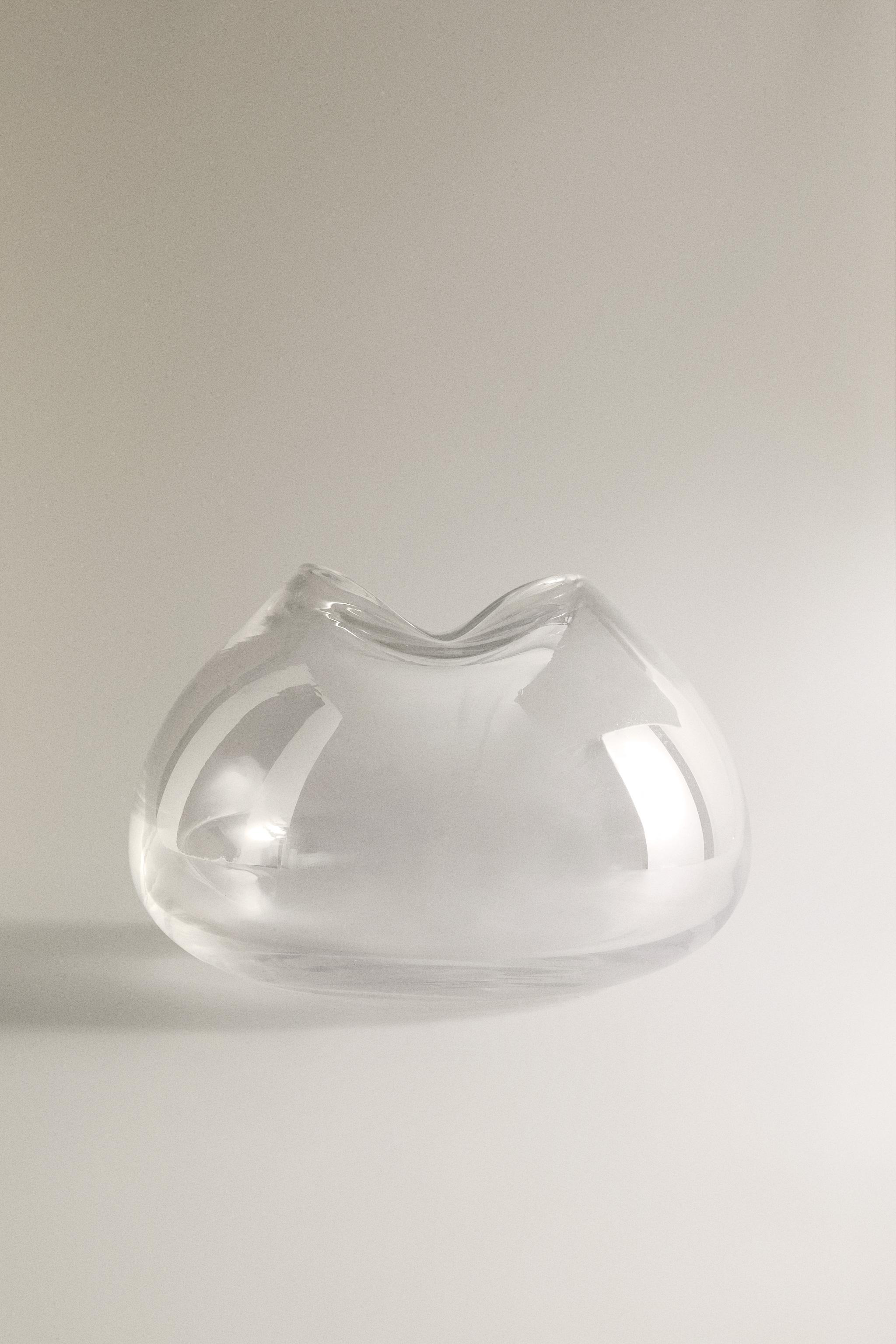 VASE WITH AN IRREGULAR LOW NECK
