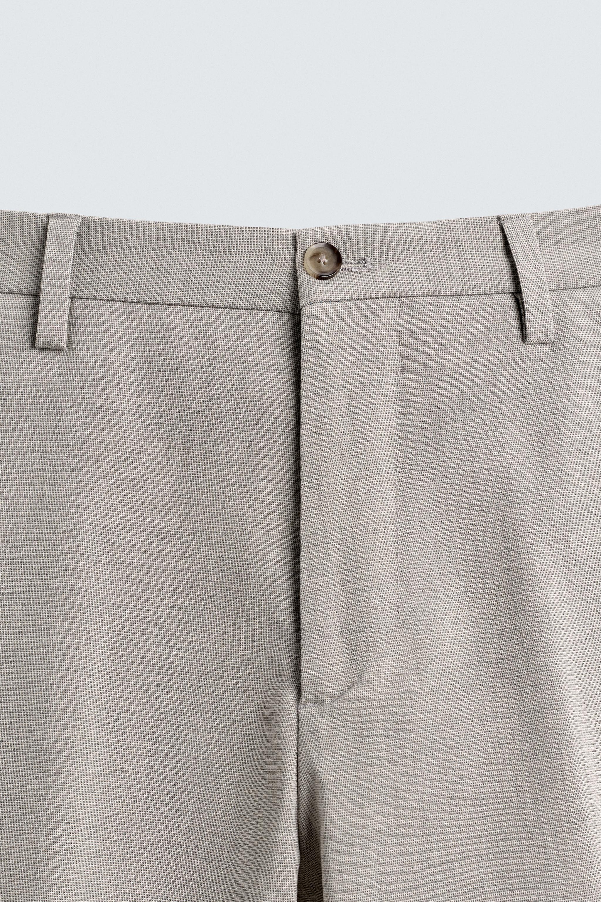 TEXTURED SUIT PANTS