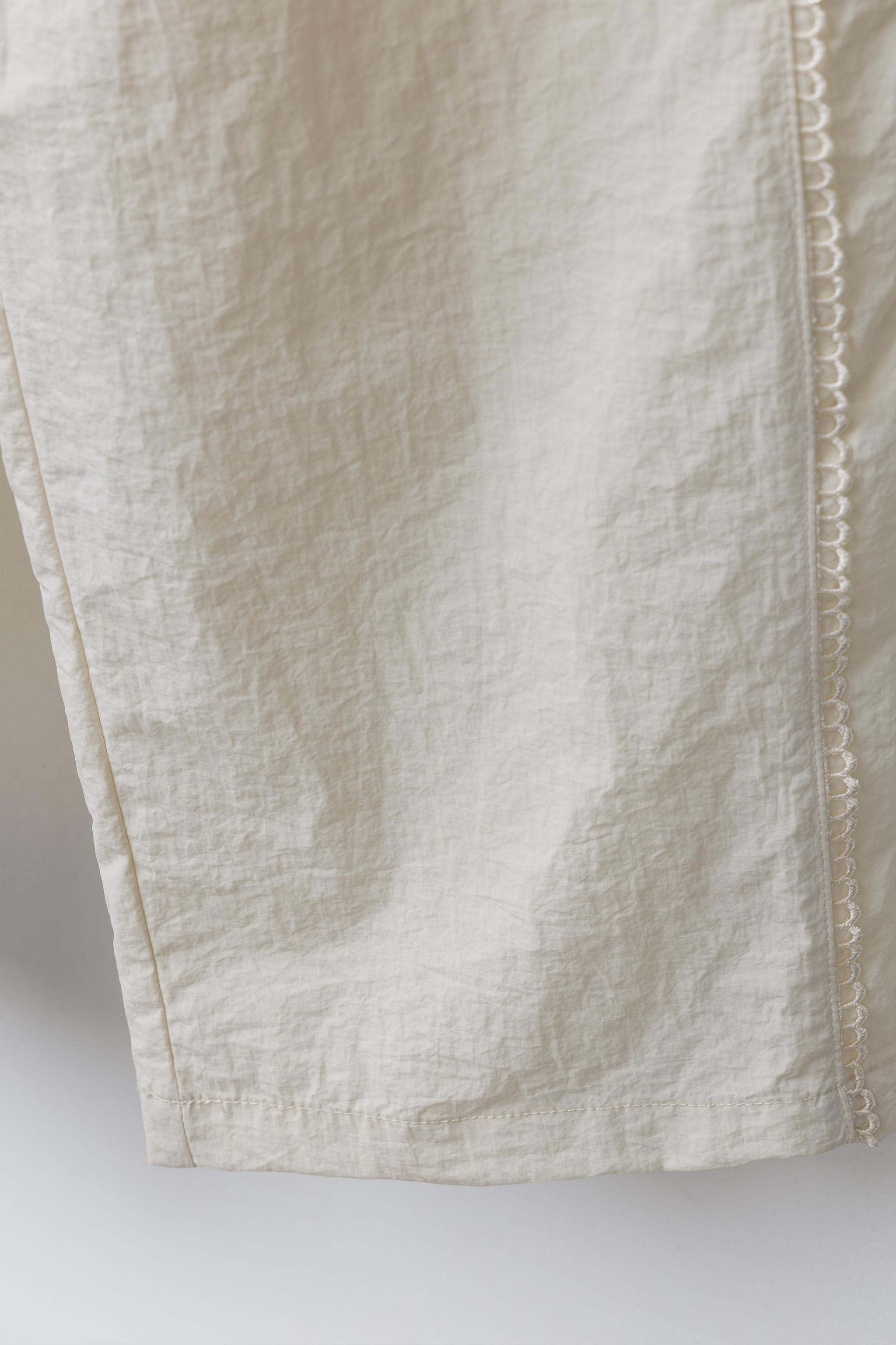 CONTRAST NYLON STRAIGHT LEG PANTS