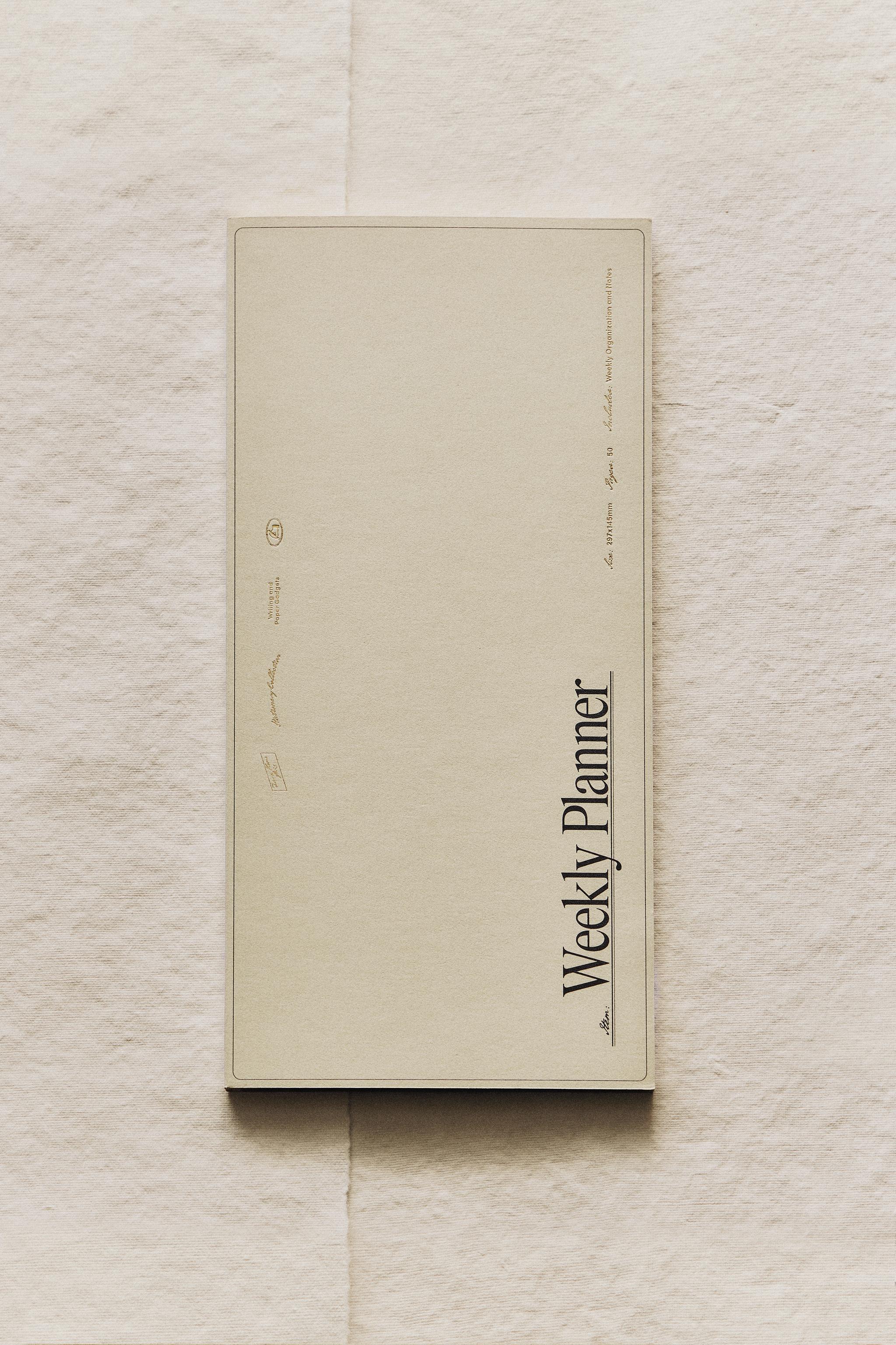 WEEKLY PLANNER WITH GOLD RIMS