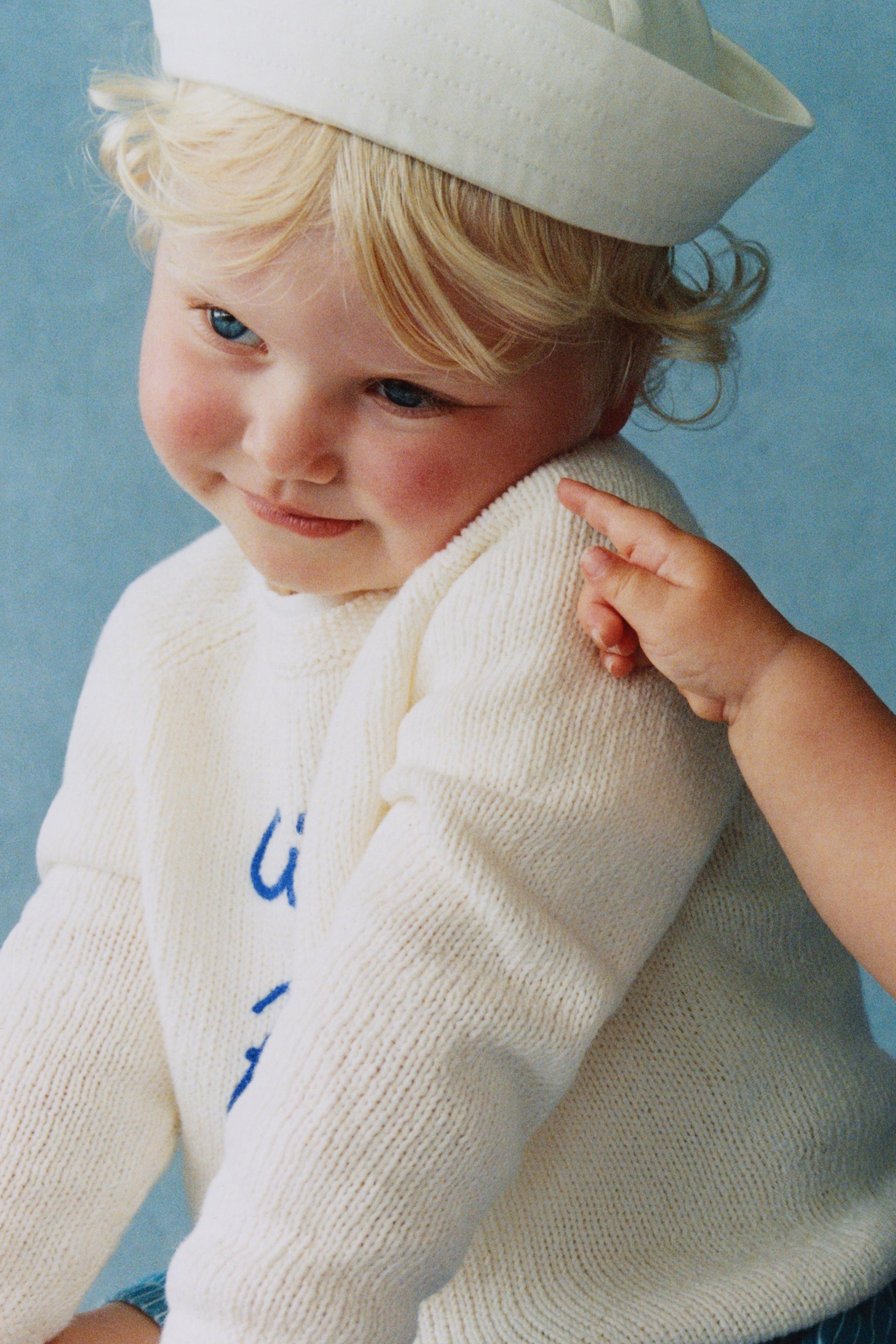 EMBROIDERED TEXT KNIT SWEATER
