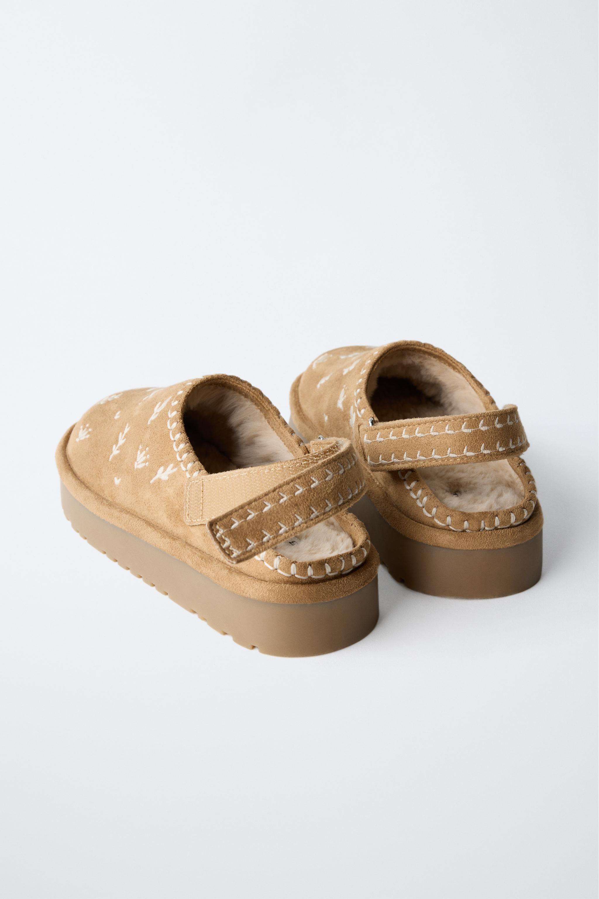 EMBROIDERED FAUX FUR CLOGS