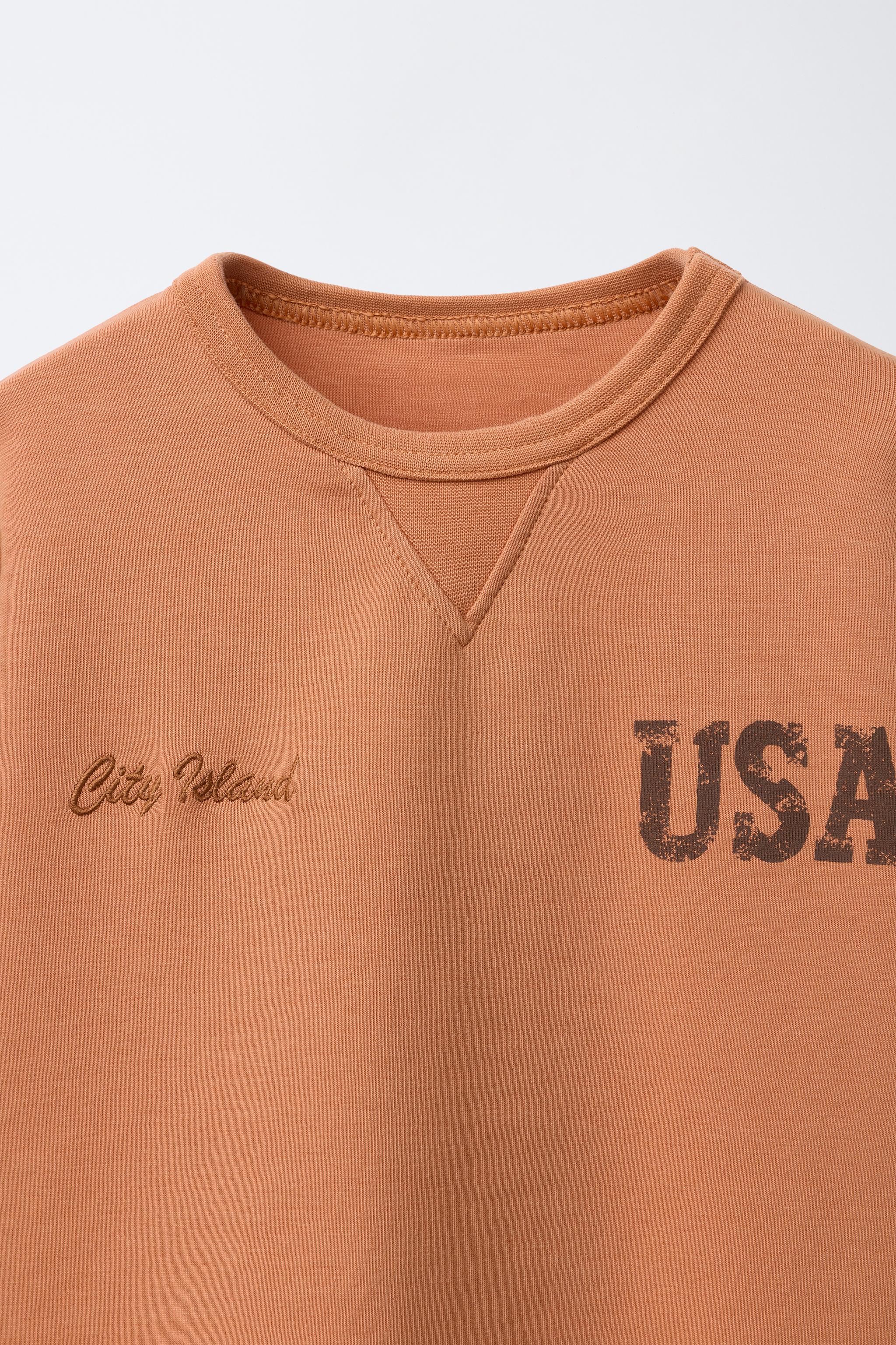 INTERLOCK TEXT T-SHIRT