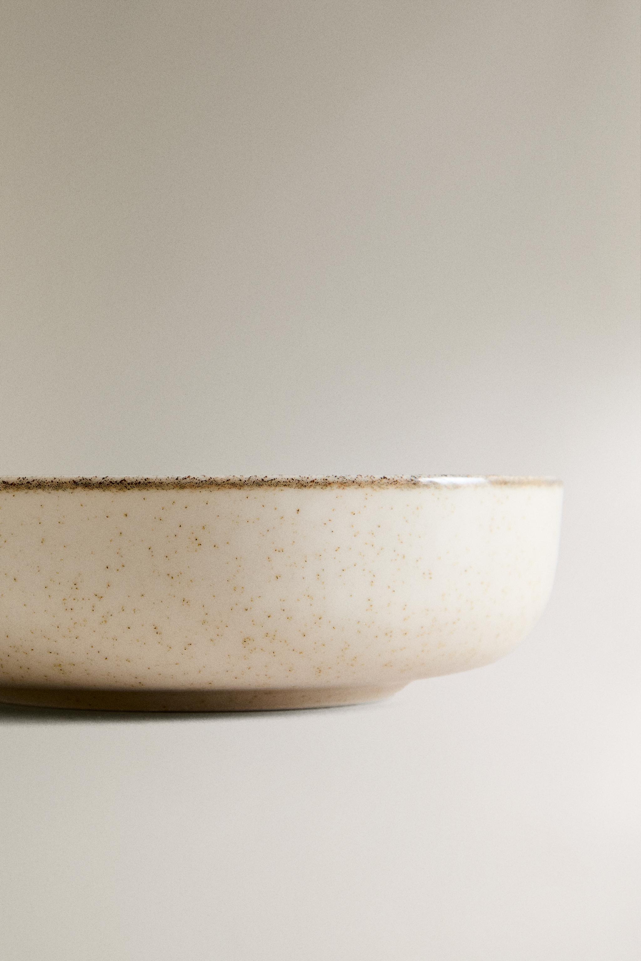 PORCELAIN BOWL WITH ANTIQUE FINISH RIM