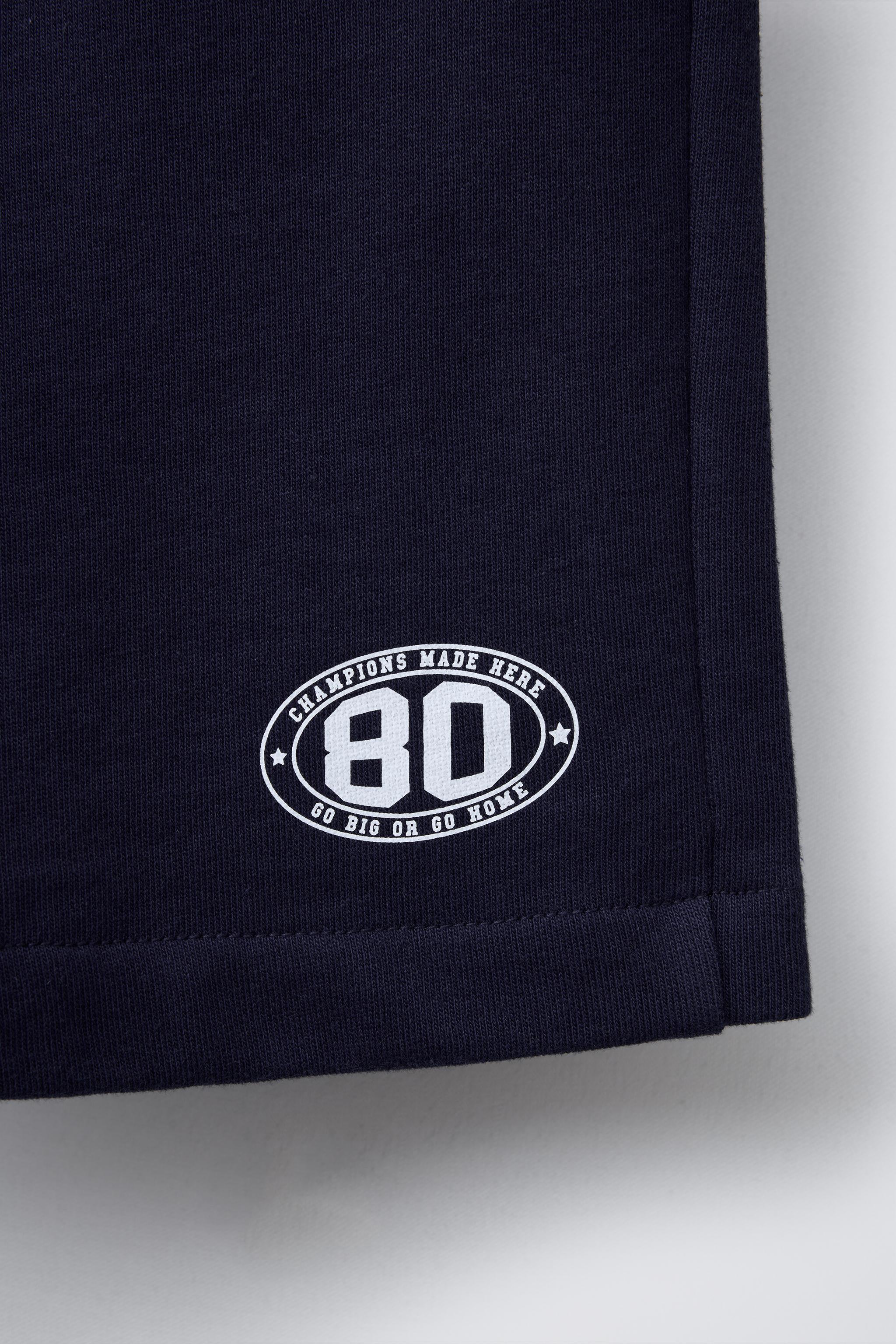 CONTRAST PIPING JOGGING SHORTS