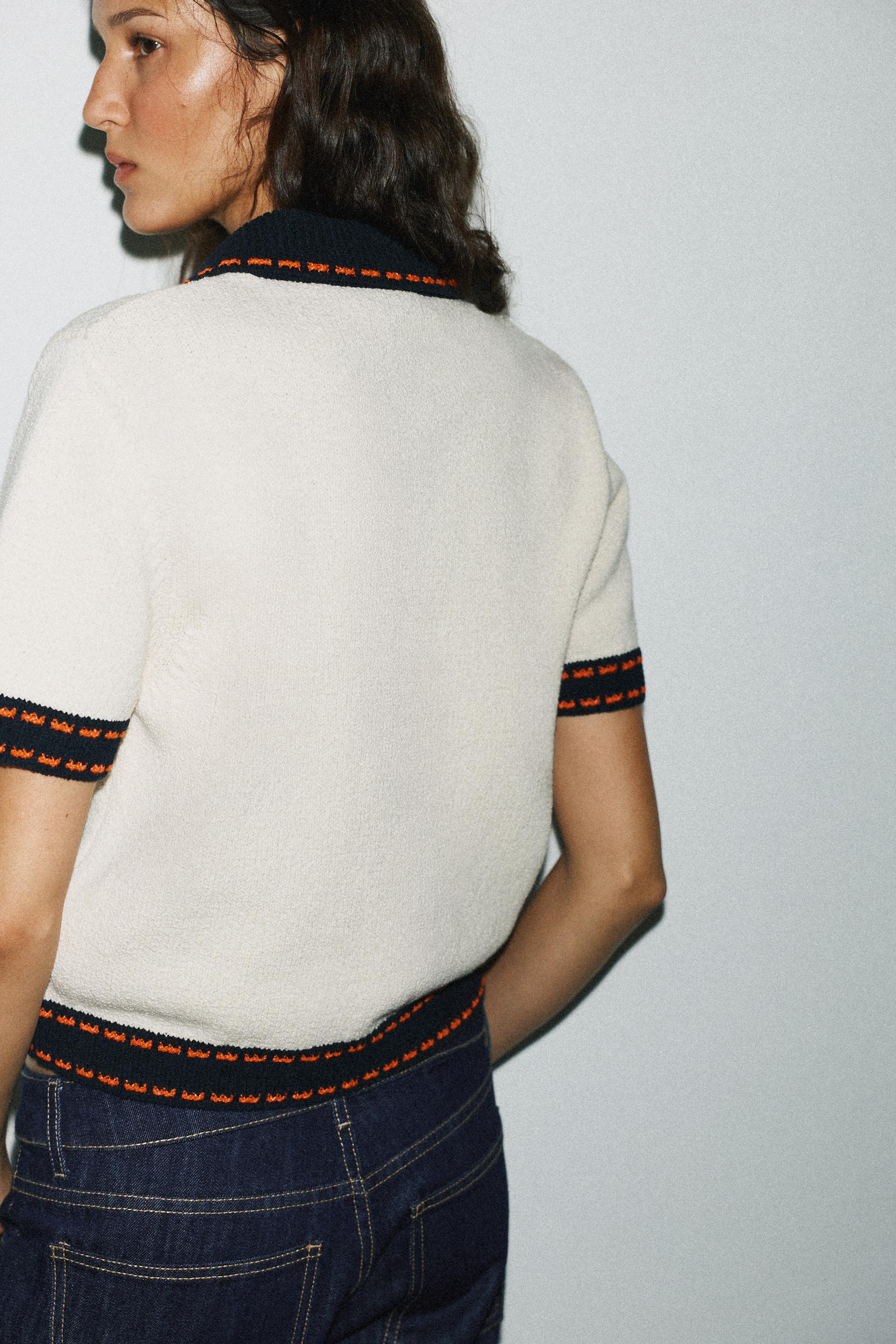 SHORT SLEEVE STITCHED KNIT CARDIGAN