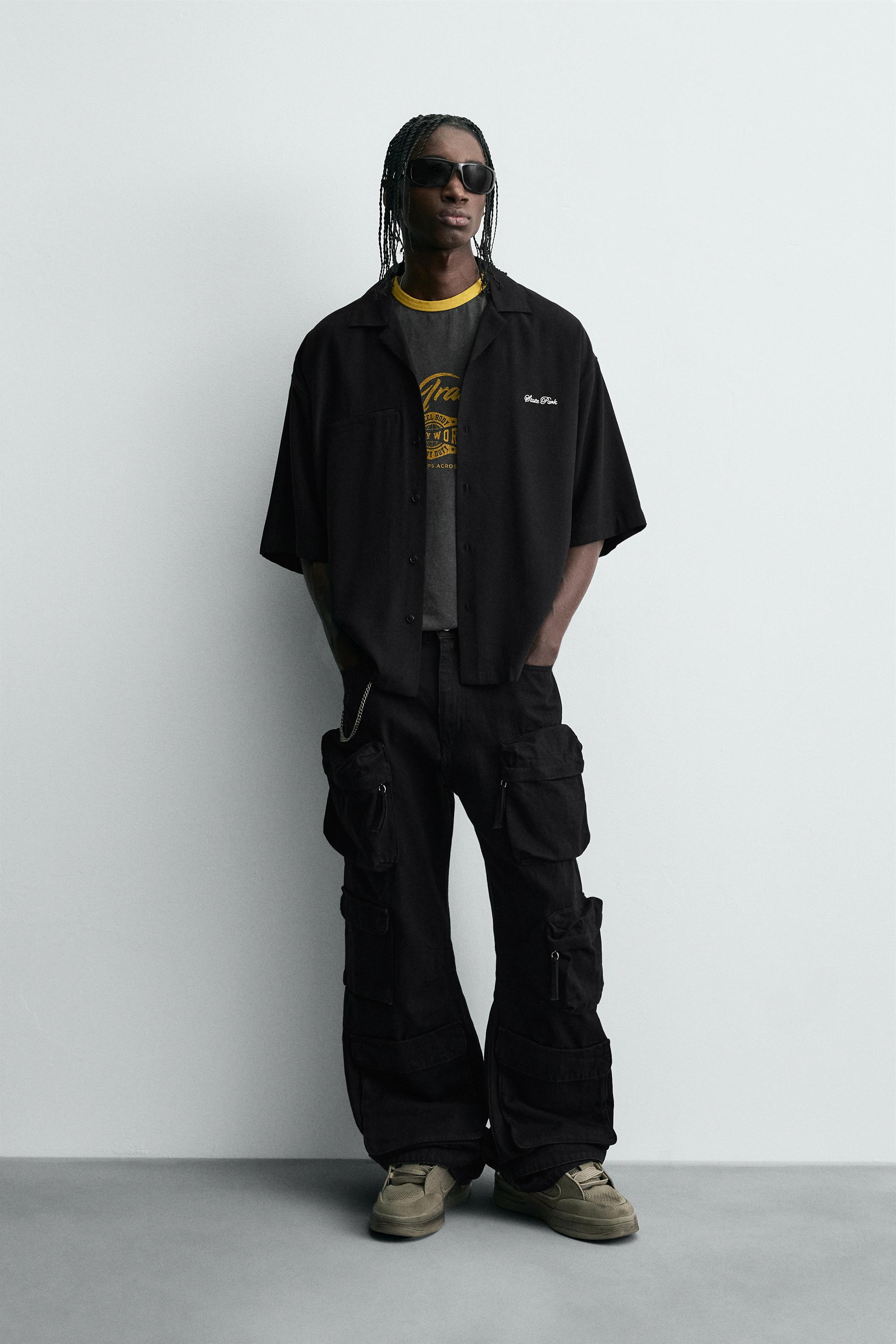 FLOWY SHIRT WITH EMBROIDERED TEXT