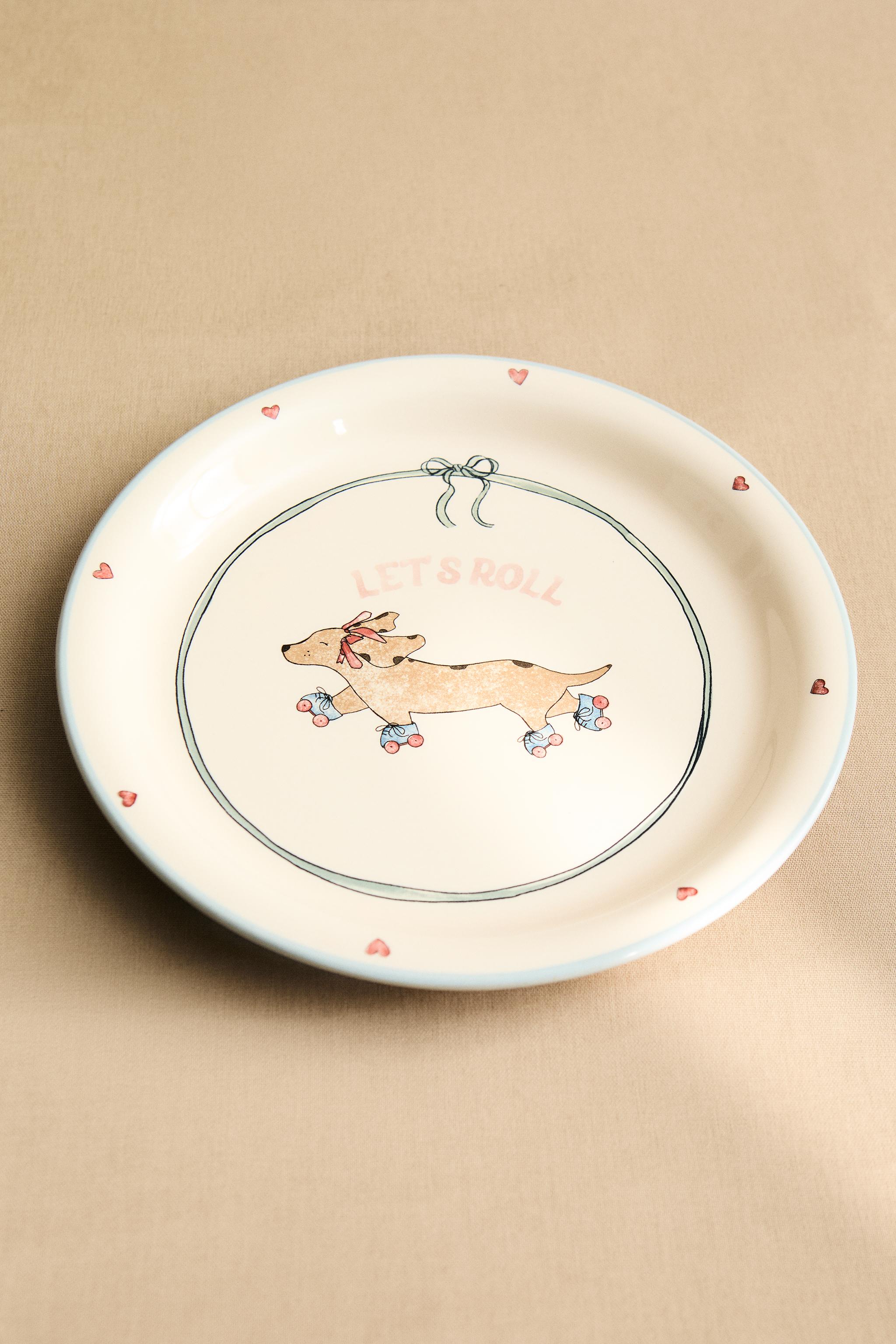 CHILDREN'S CERAMIC SKATING DOG PLATE