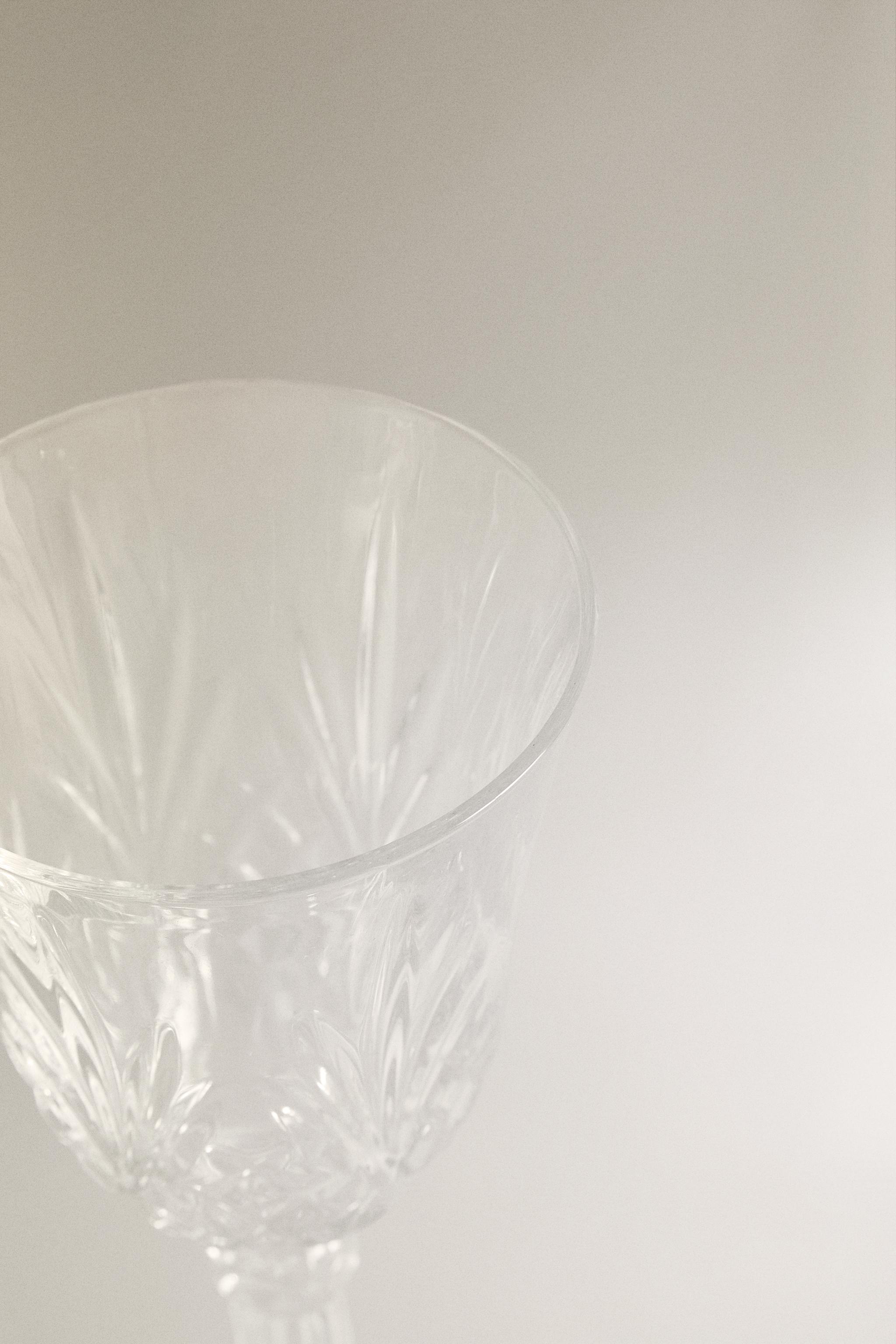 CARVED CRYSTALLINE GLASS