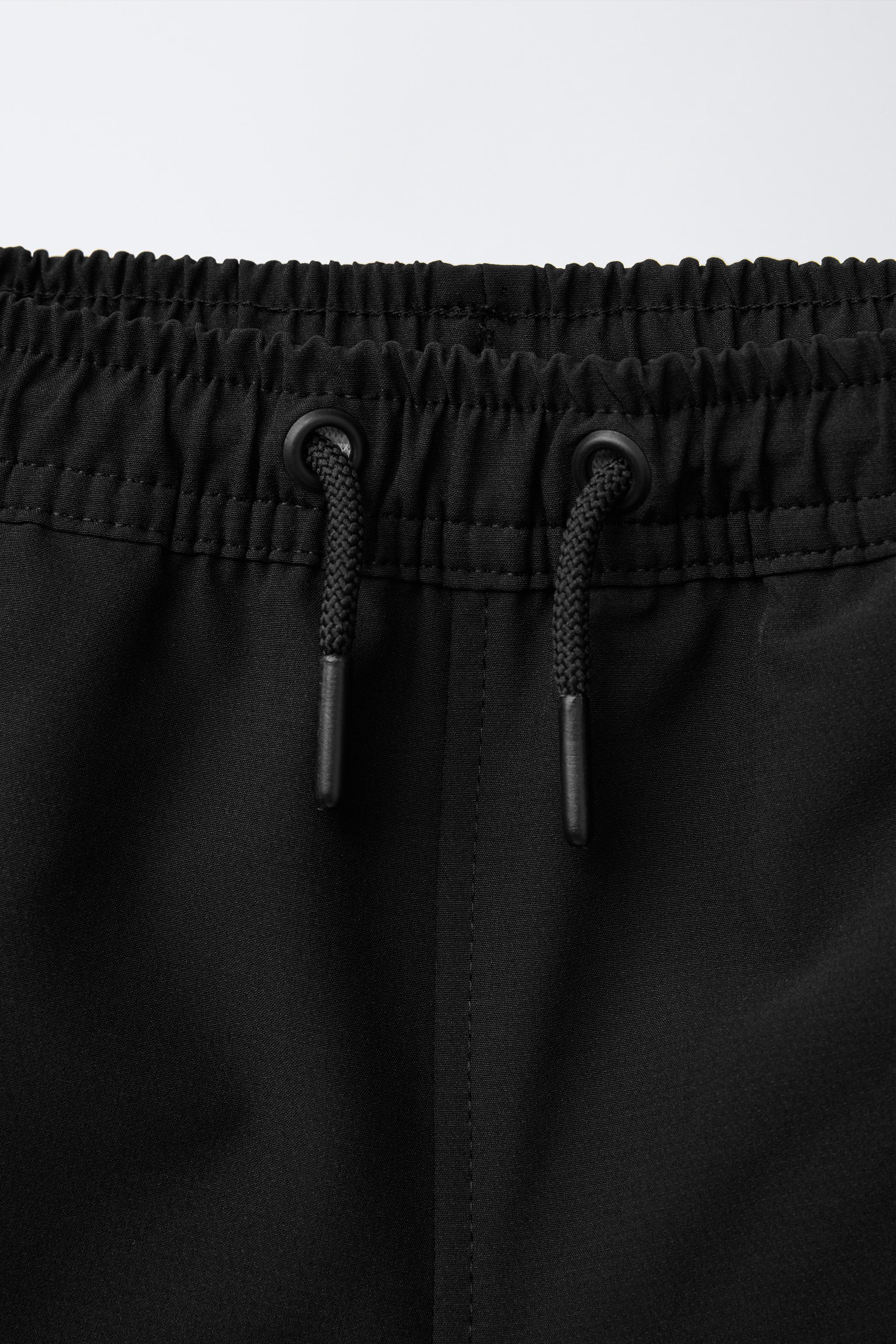 TECHNICAL LOGO SHORTS