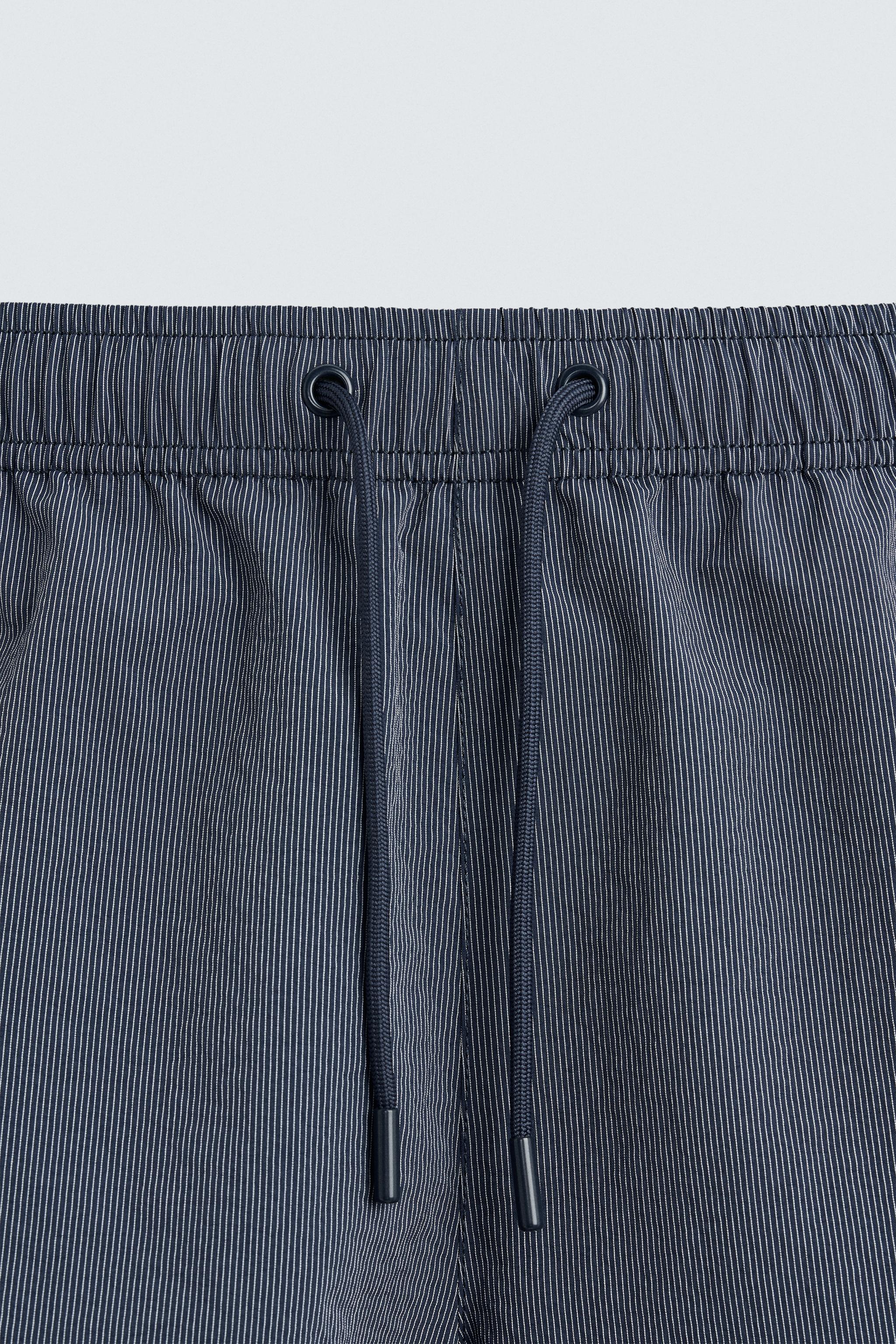 STRIPED MID-LENGTH SWIMSUIT