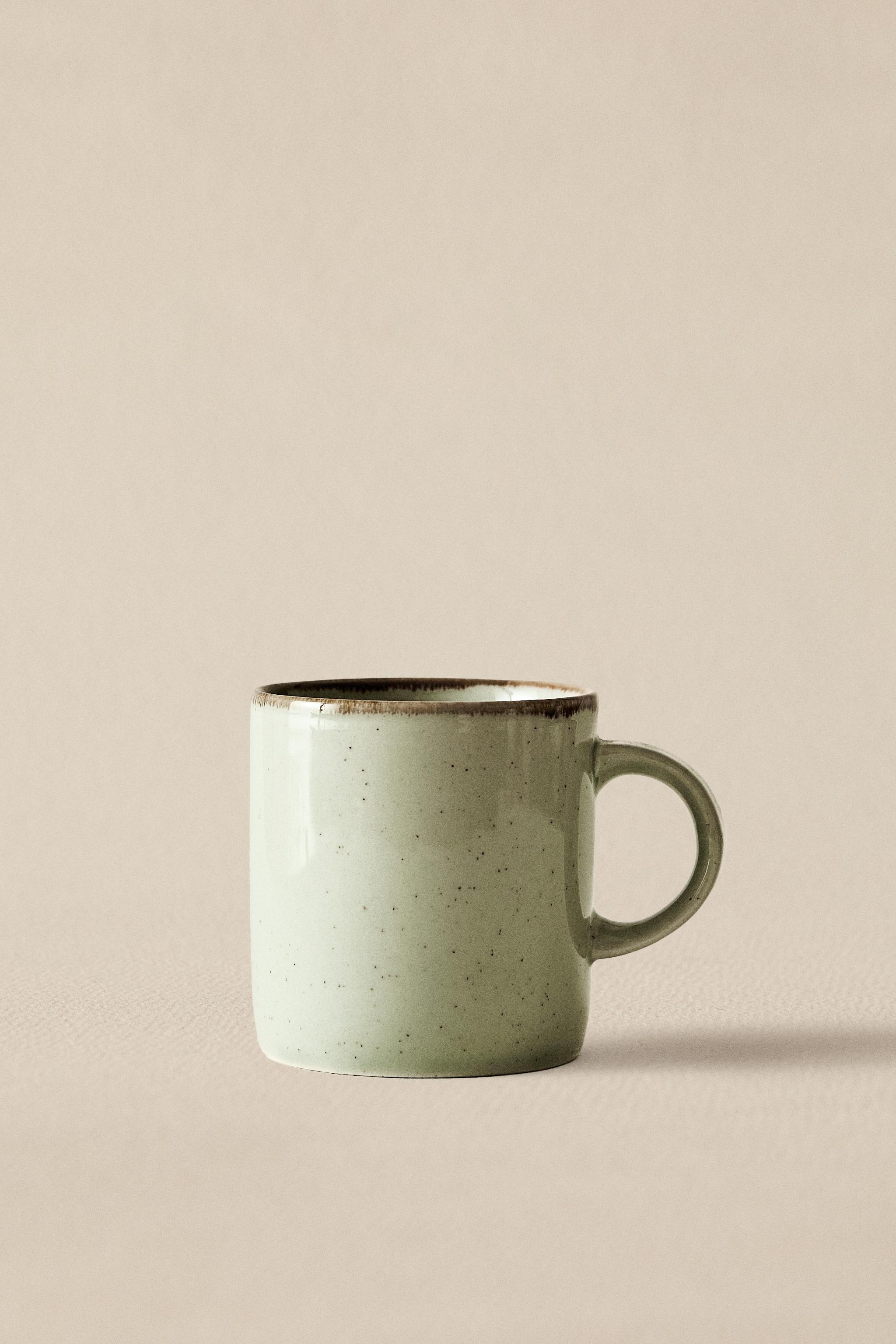 PORCELAIN MUG WITH ANTIQUE FINISH RIM