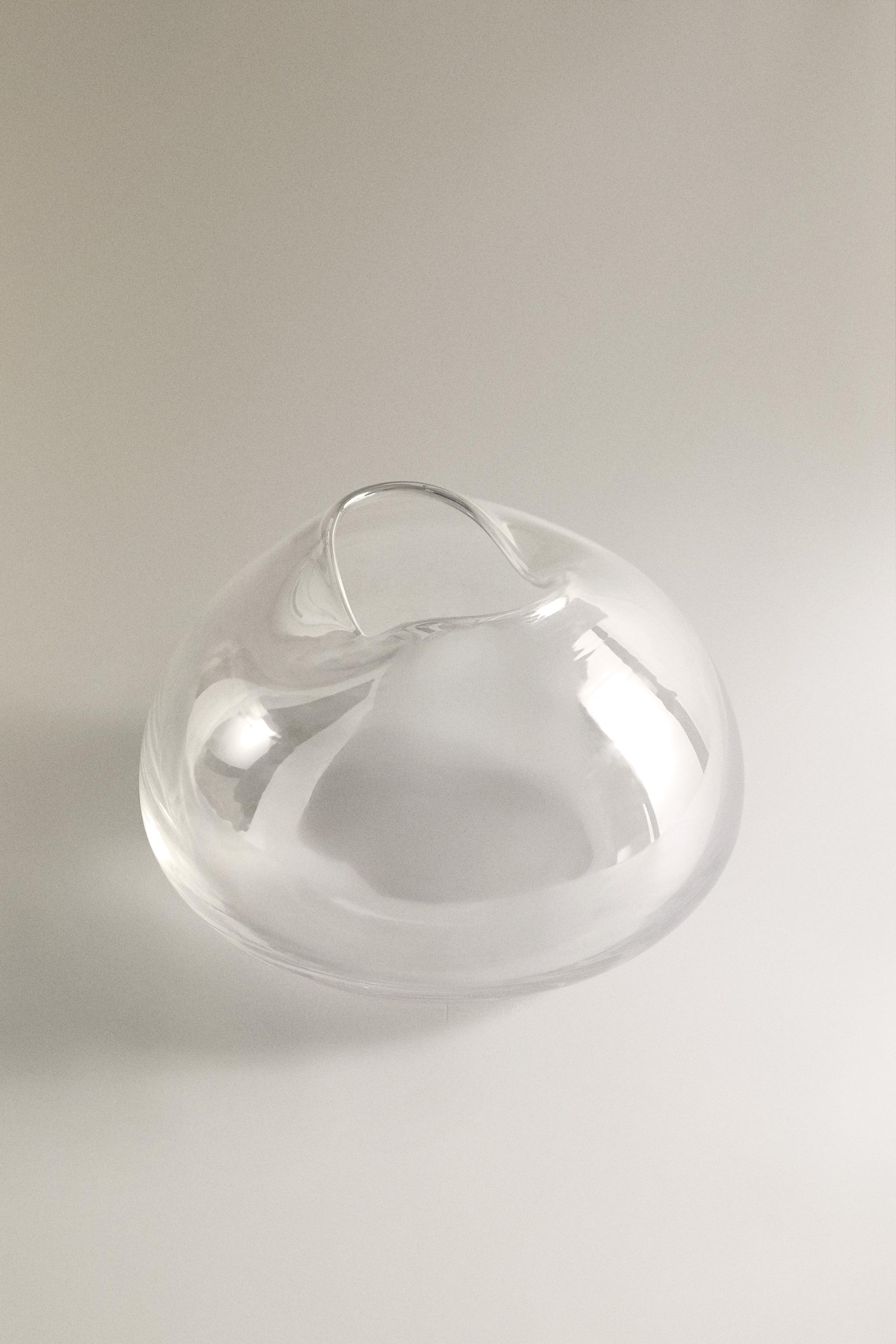 VASE WITH AN IRREGULAR LOW NECK