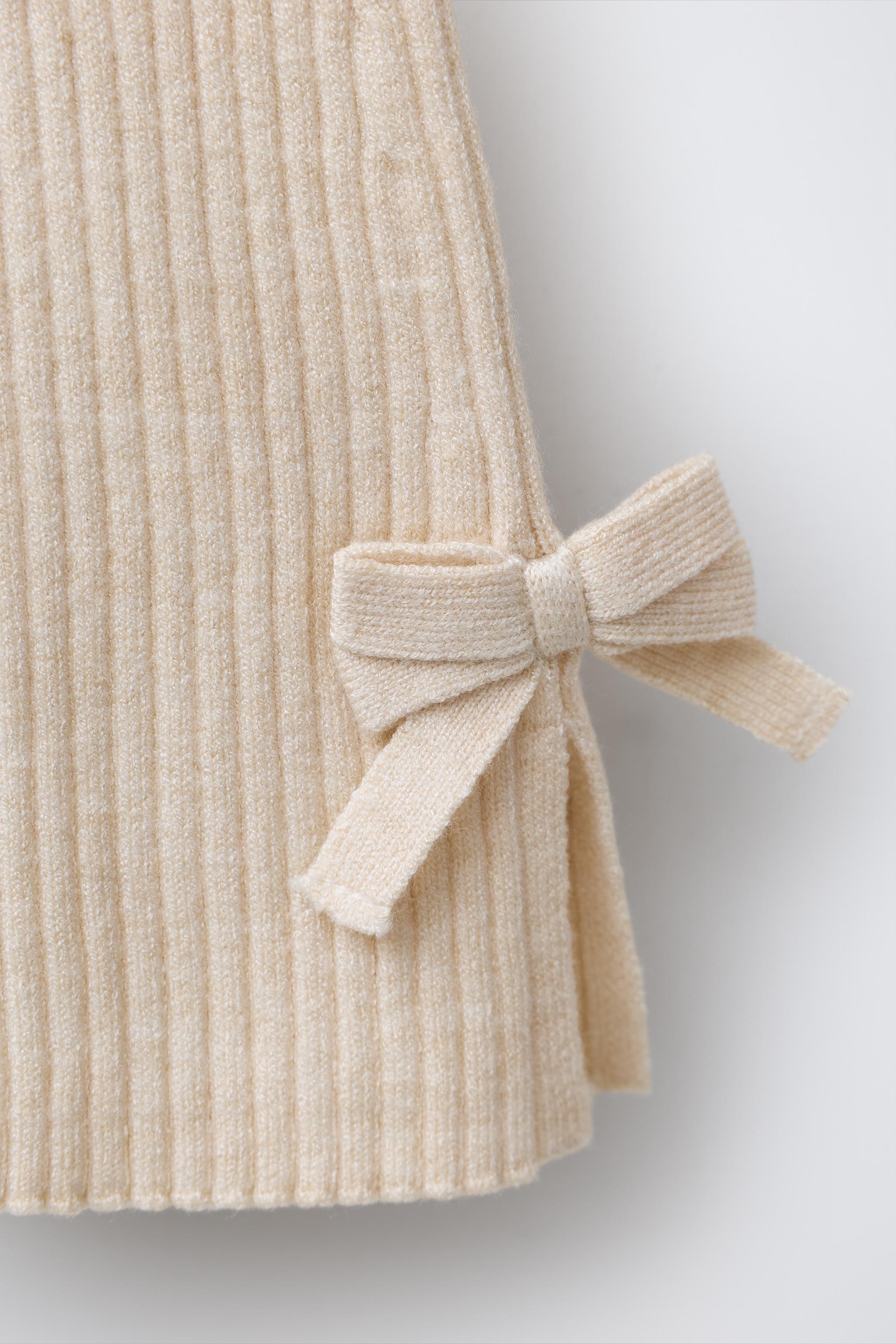 BOW DETAIL KNIT FLARE LEGGINGS