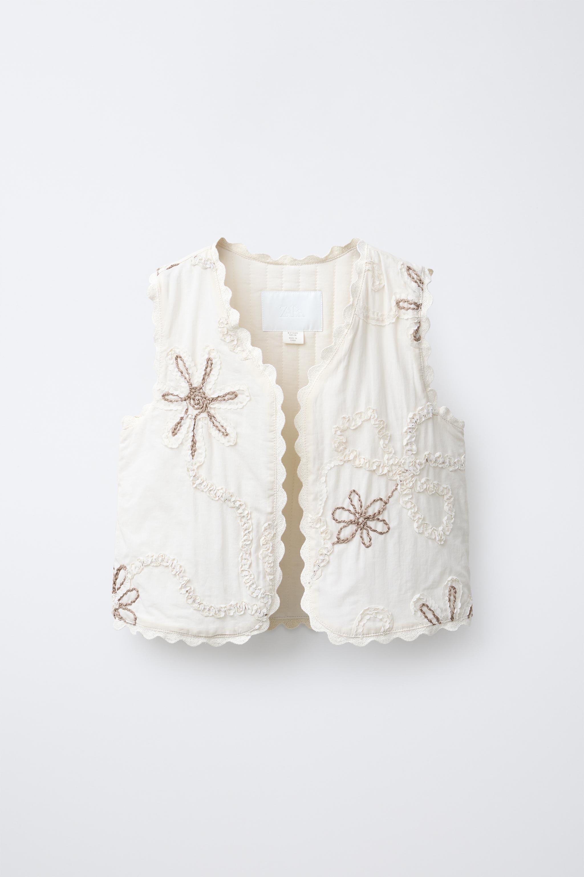 EMBROIDERED FLOWER VEST