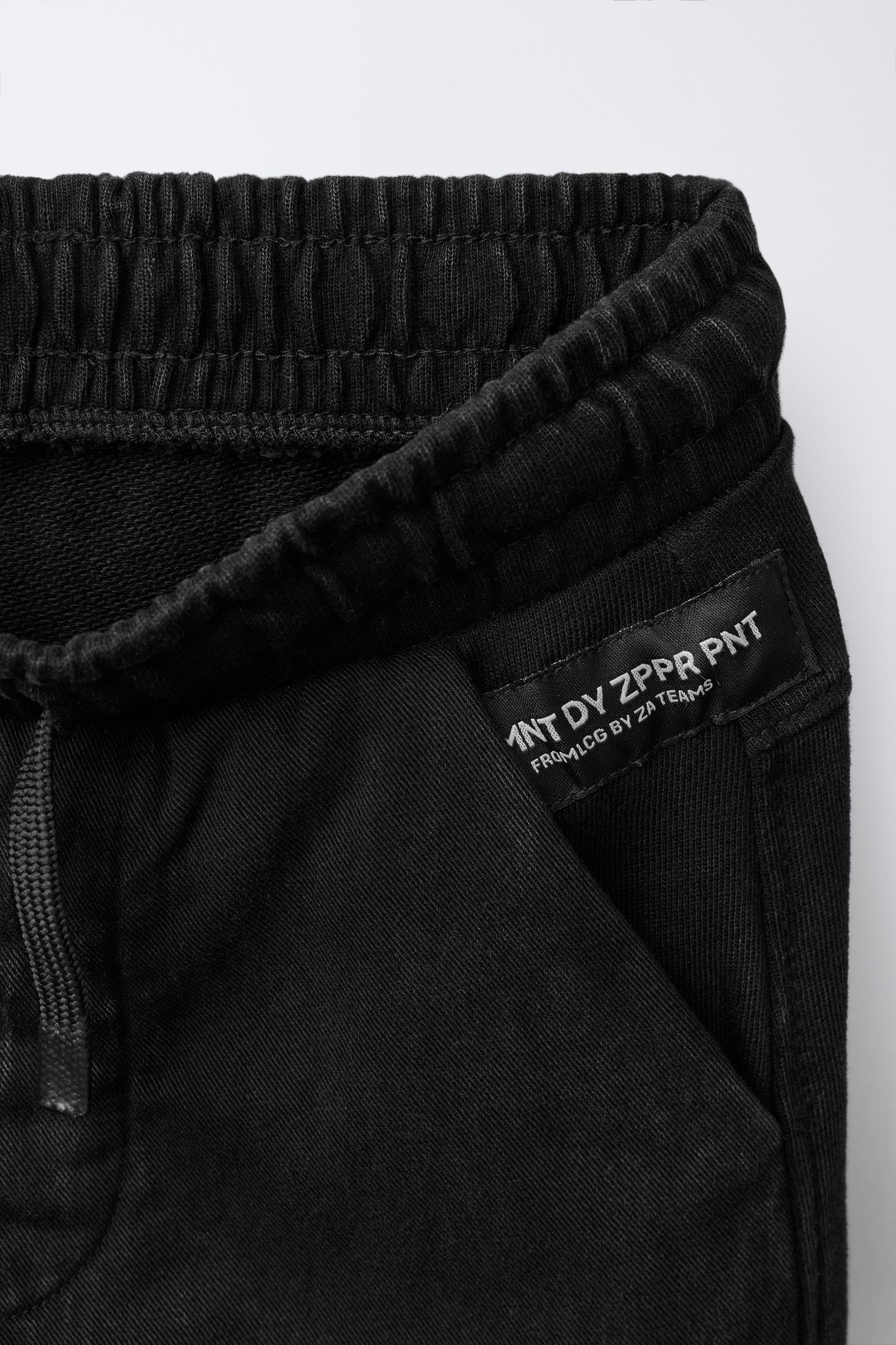 JOGGER PANTS WITH ZIPPERS