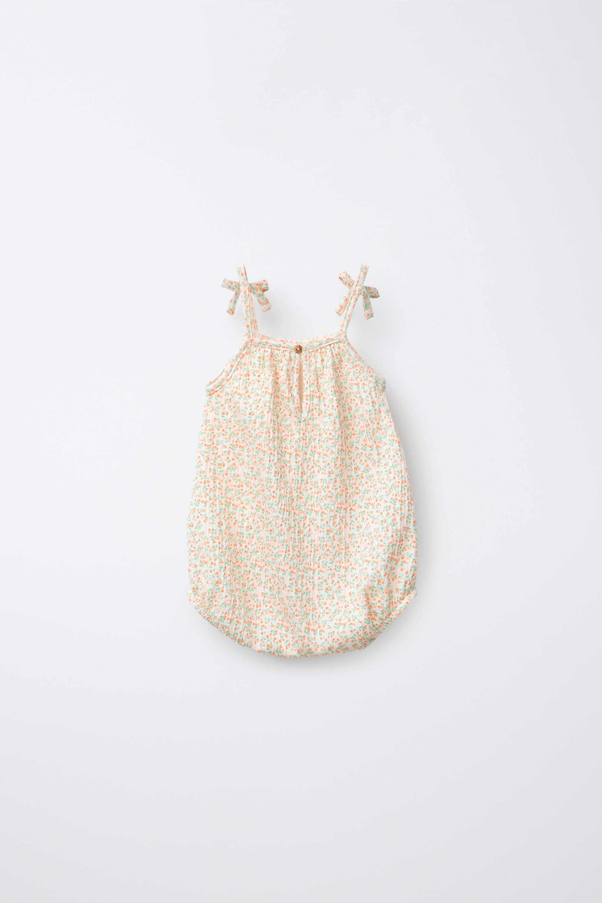 TEXTURED FLORAL BODYSUIT