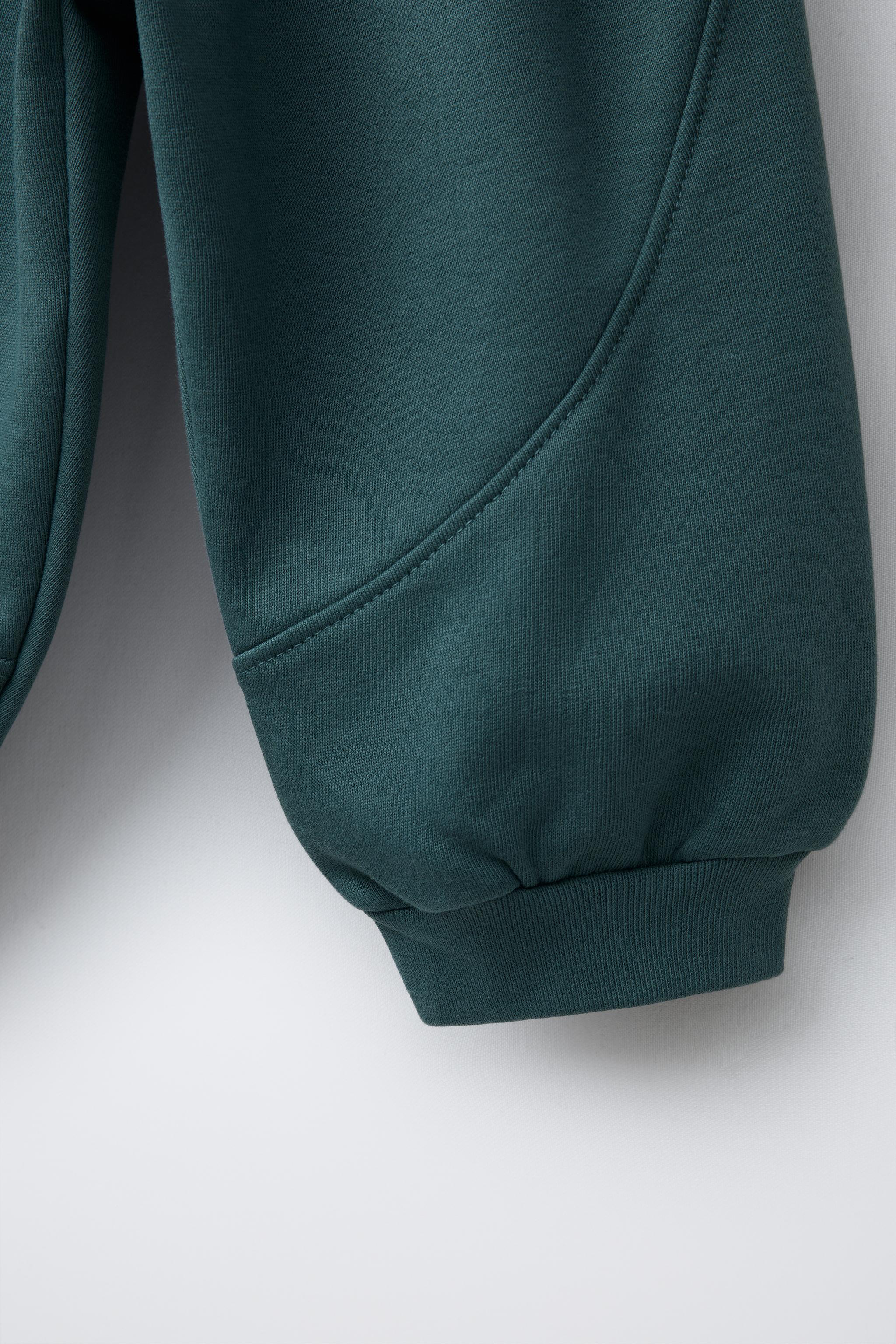 CUT-OUT JOGGER PANTS