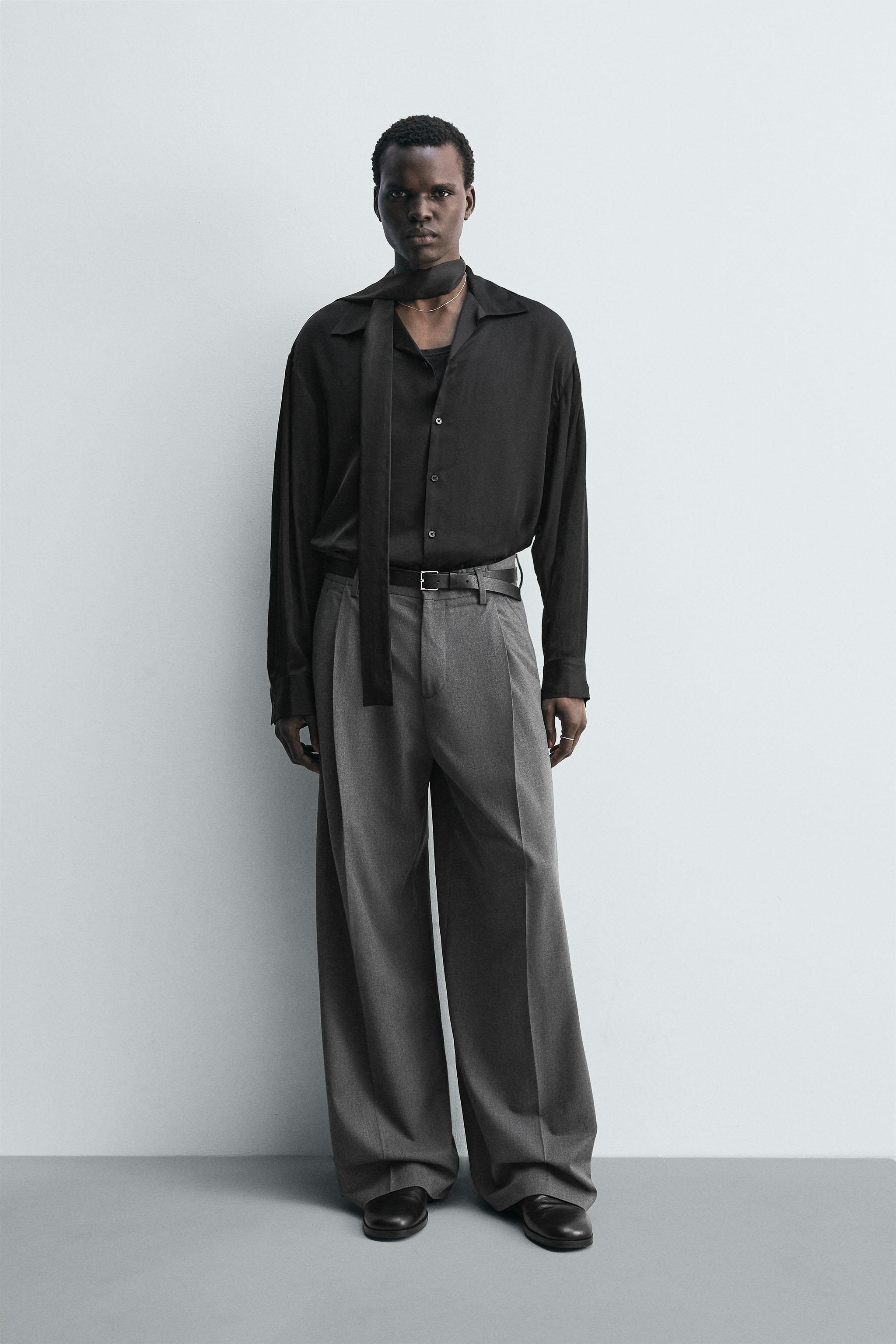 PLEATED WIDE FIT PANTS