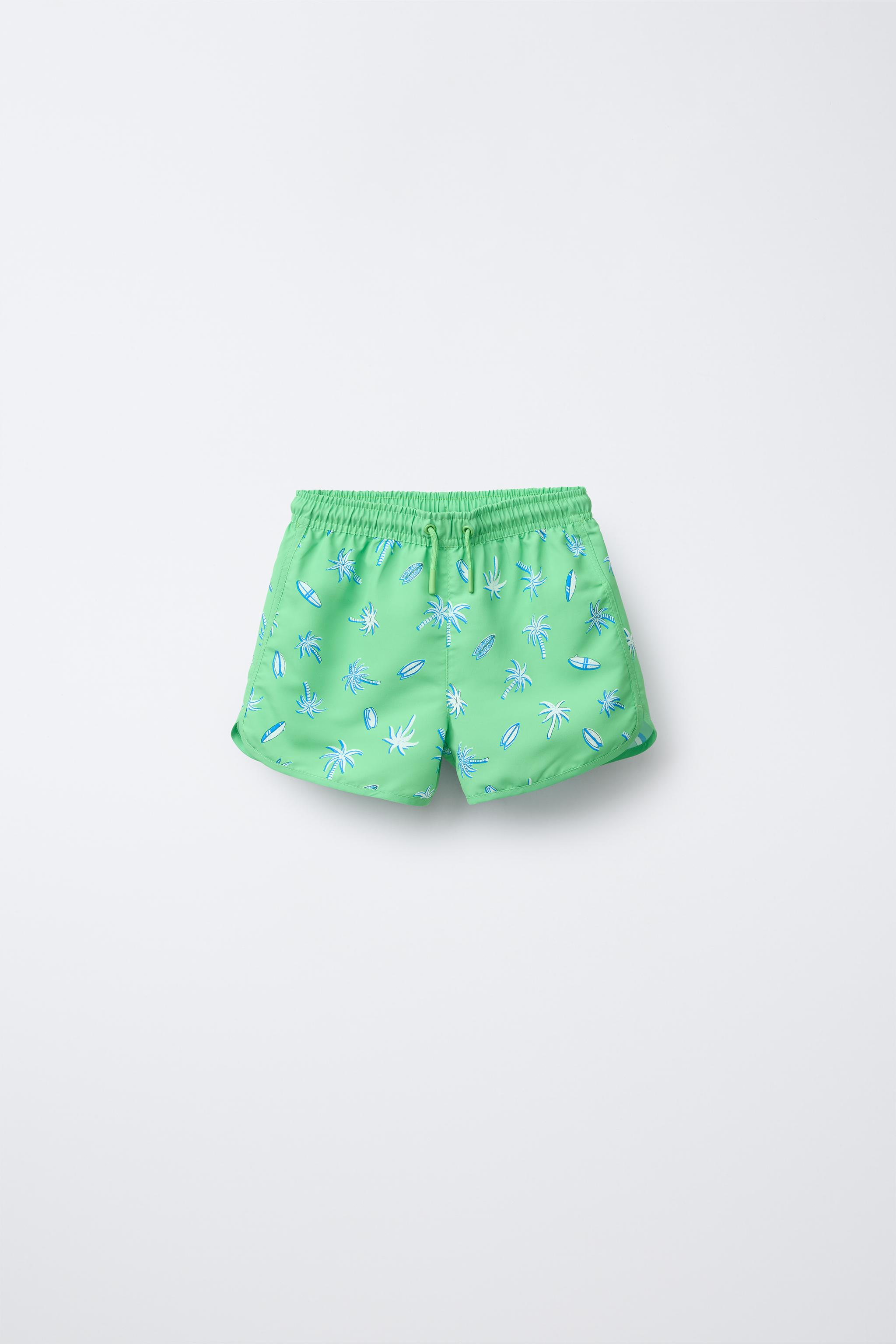 6-14 YEARS/ PALM TREE AND SURF SWIM SHORTS