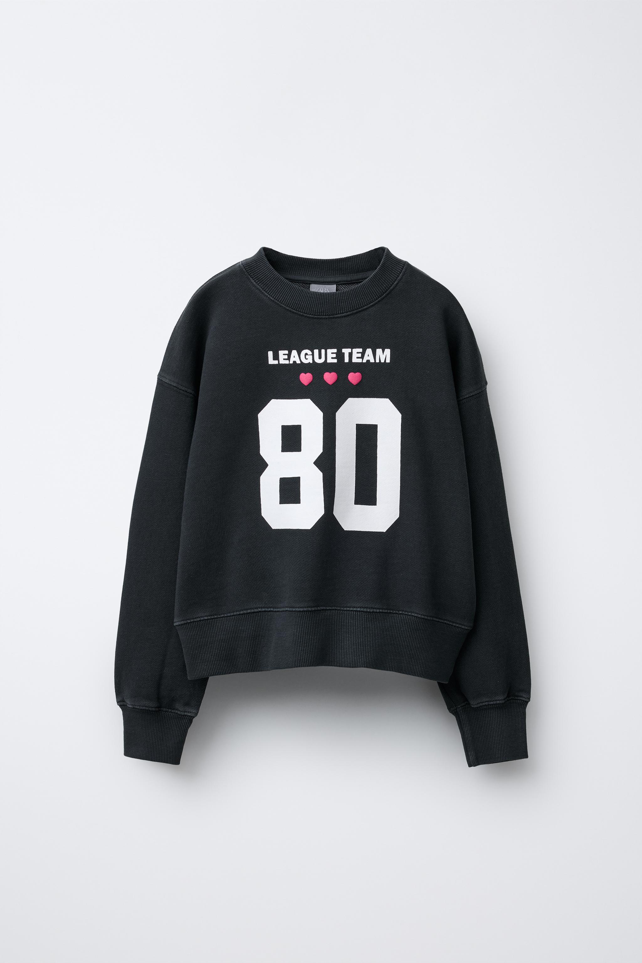 VARSITY PRINT SWEATSHIRT