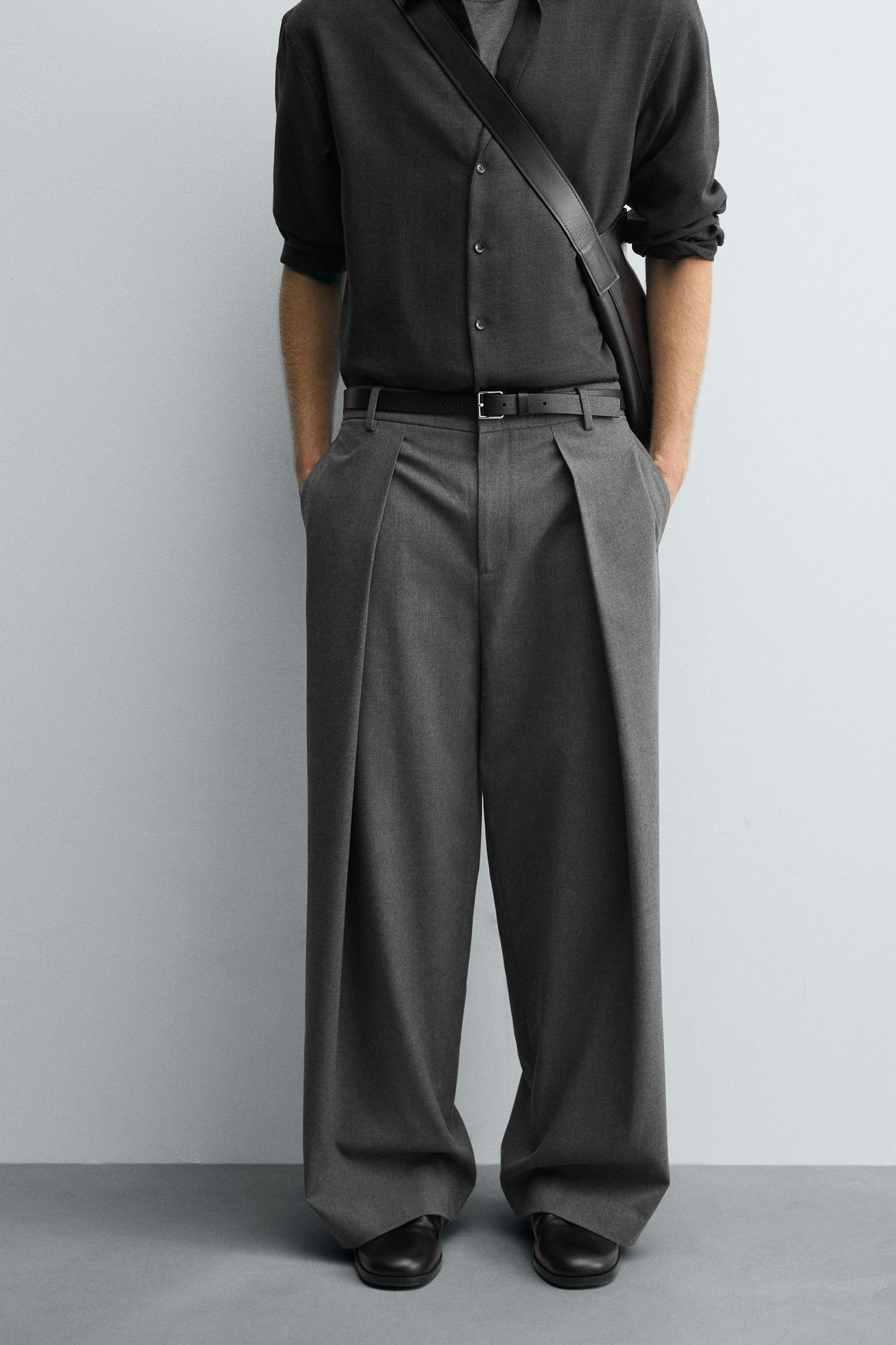 PLEATED WIDE FIT PANTS