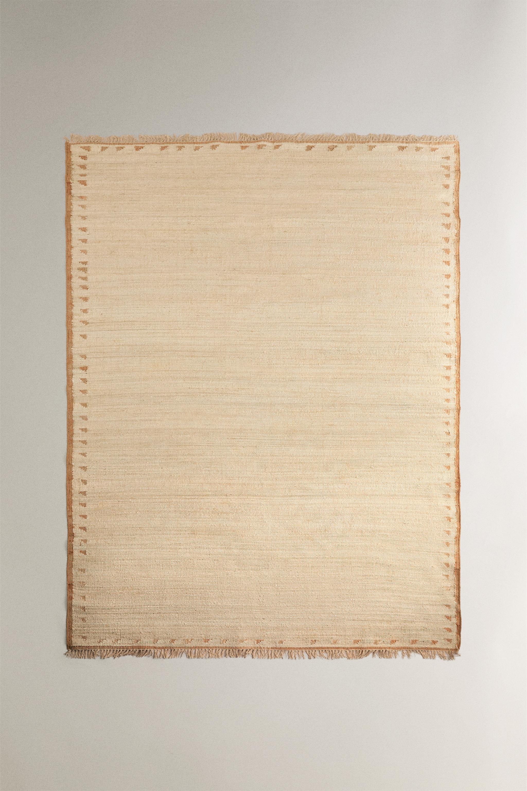 JUTE AND COTTON AREA RUG WITH FRINGING