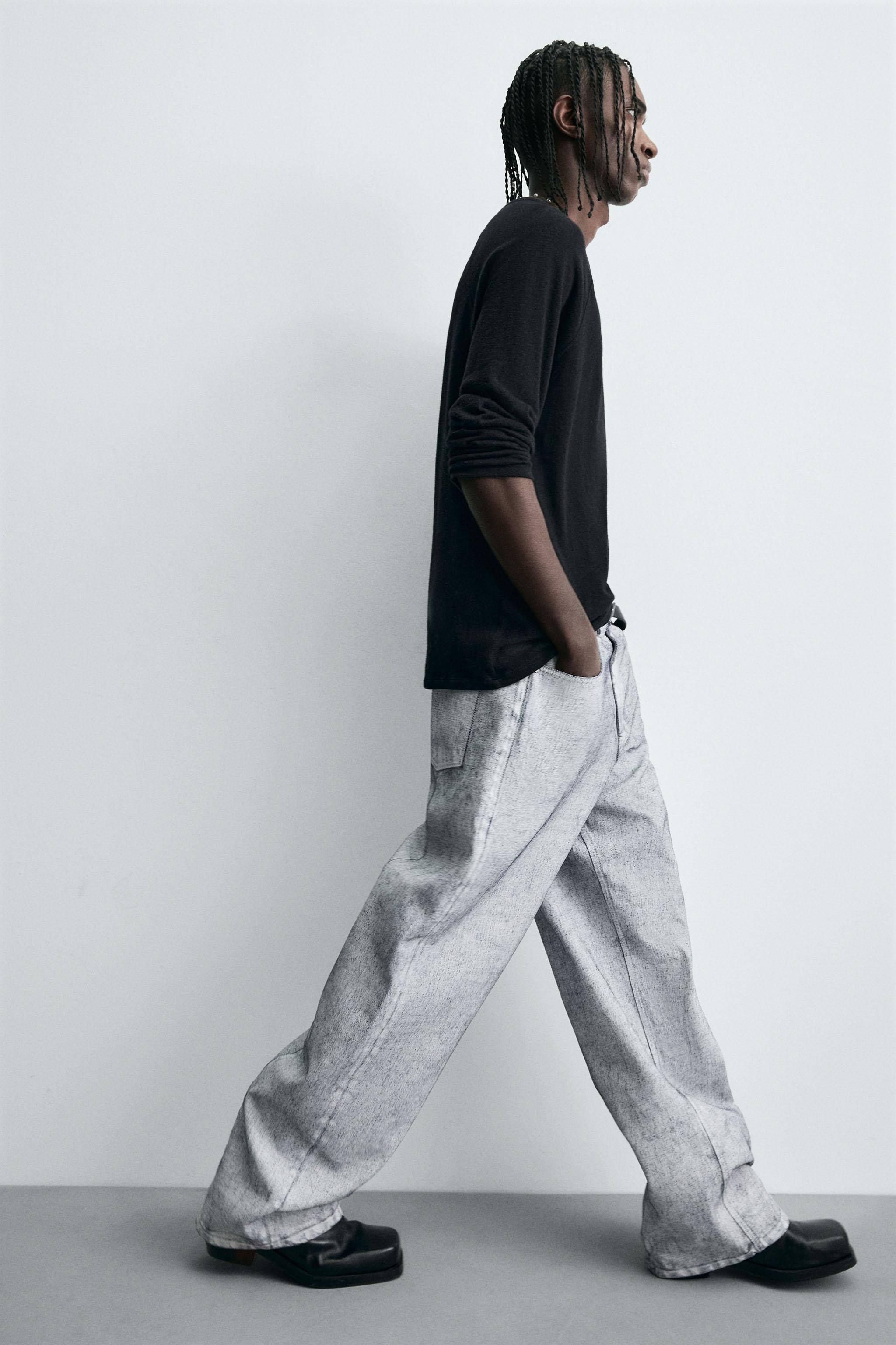 WAXED FINISH BAGGY FIT JEANS