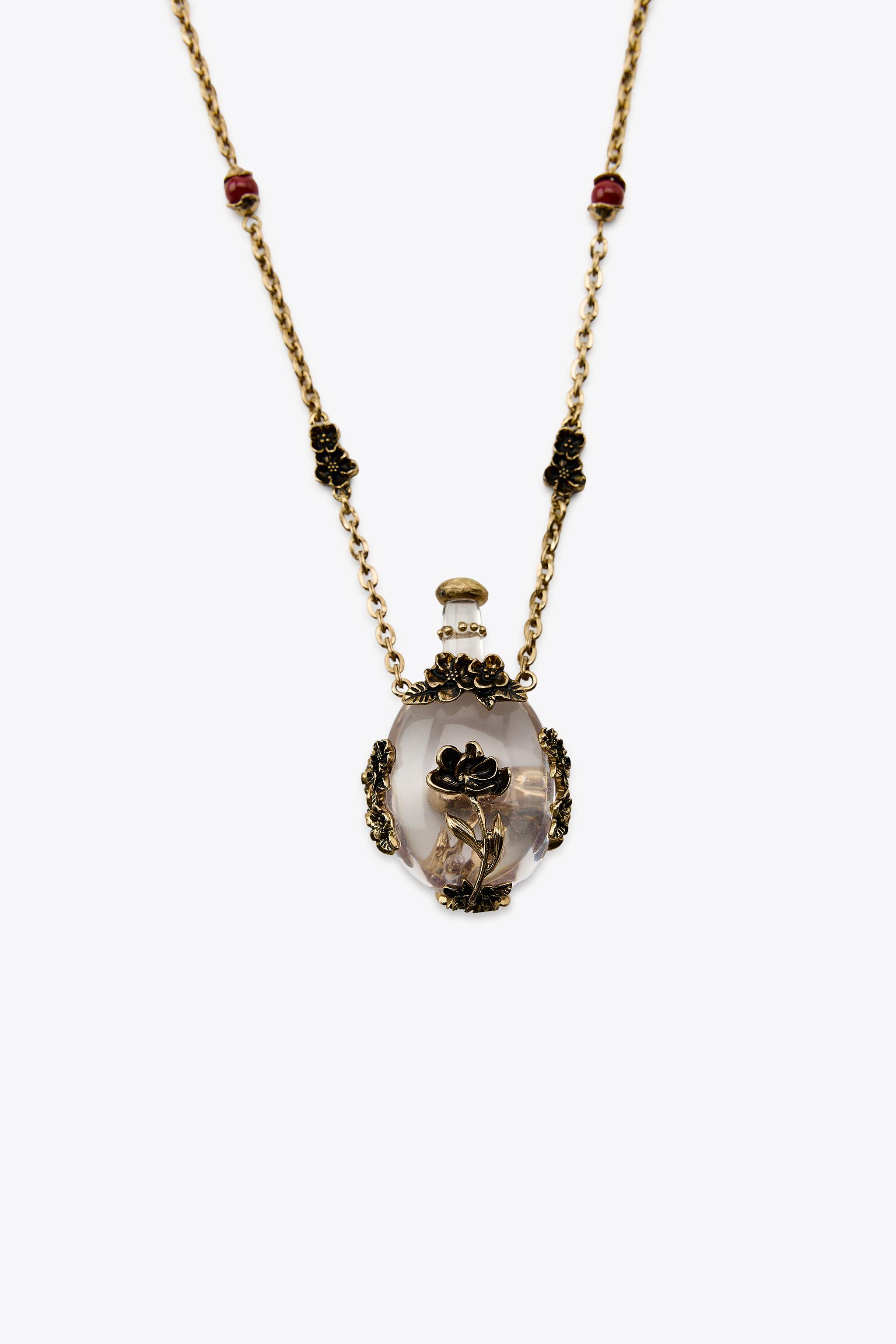 METAL FLOWER BOTTLE NECKLACE