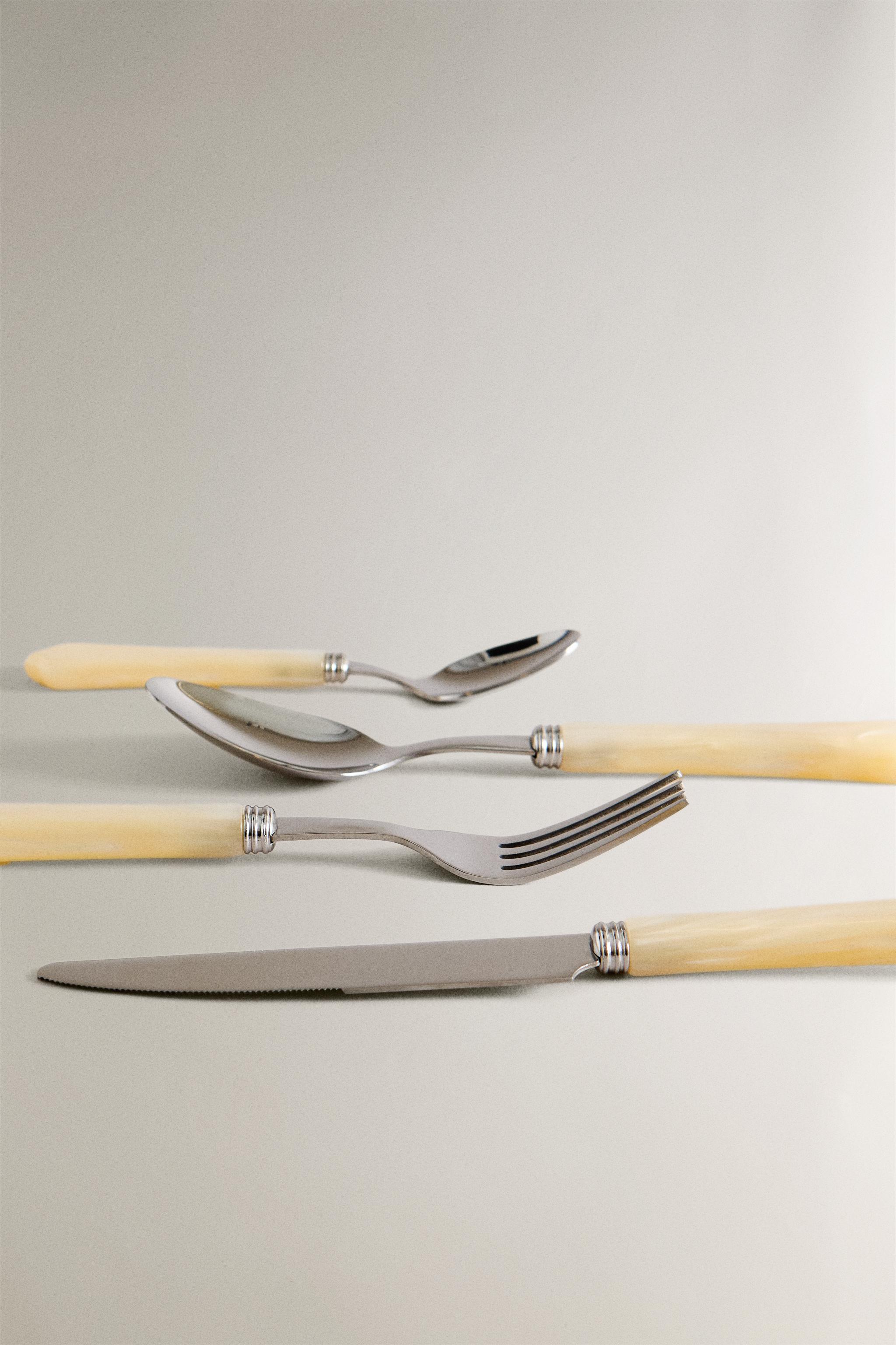 4-PIECE FLATWARE SET WITH PEARL-EFFECT HANDLE