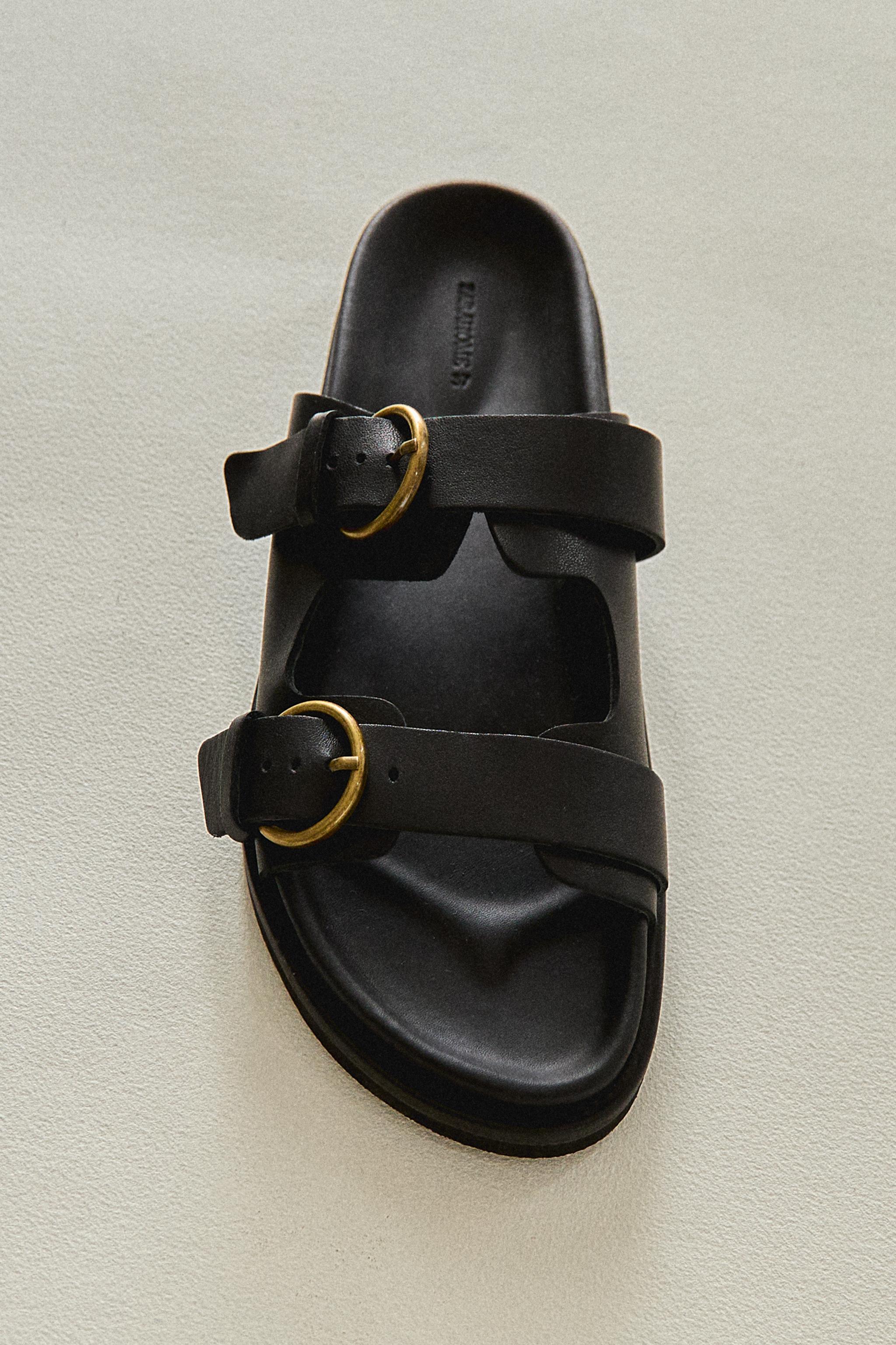FLAT LEATHER SANDALS WITH BUCKLES