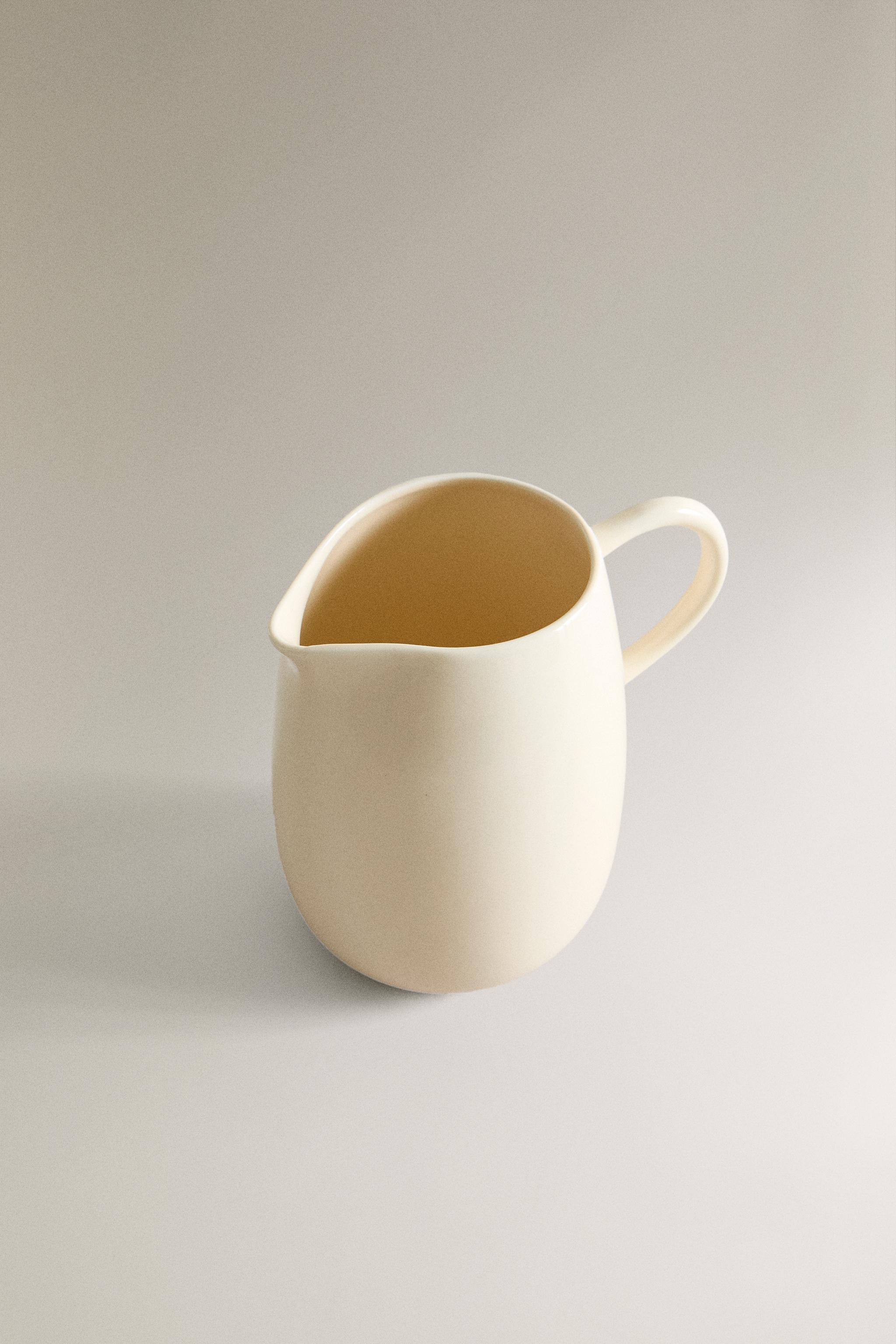 PLAIN STONEWARE MILK PITCHER